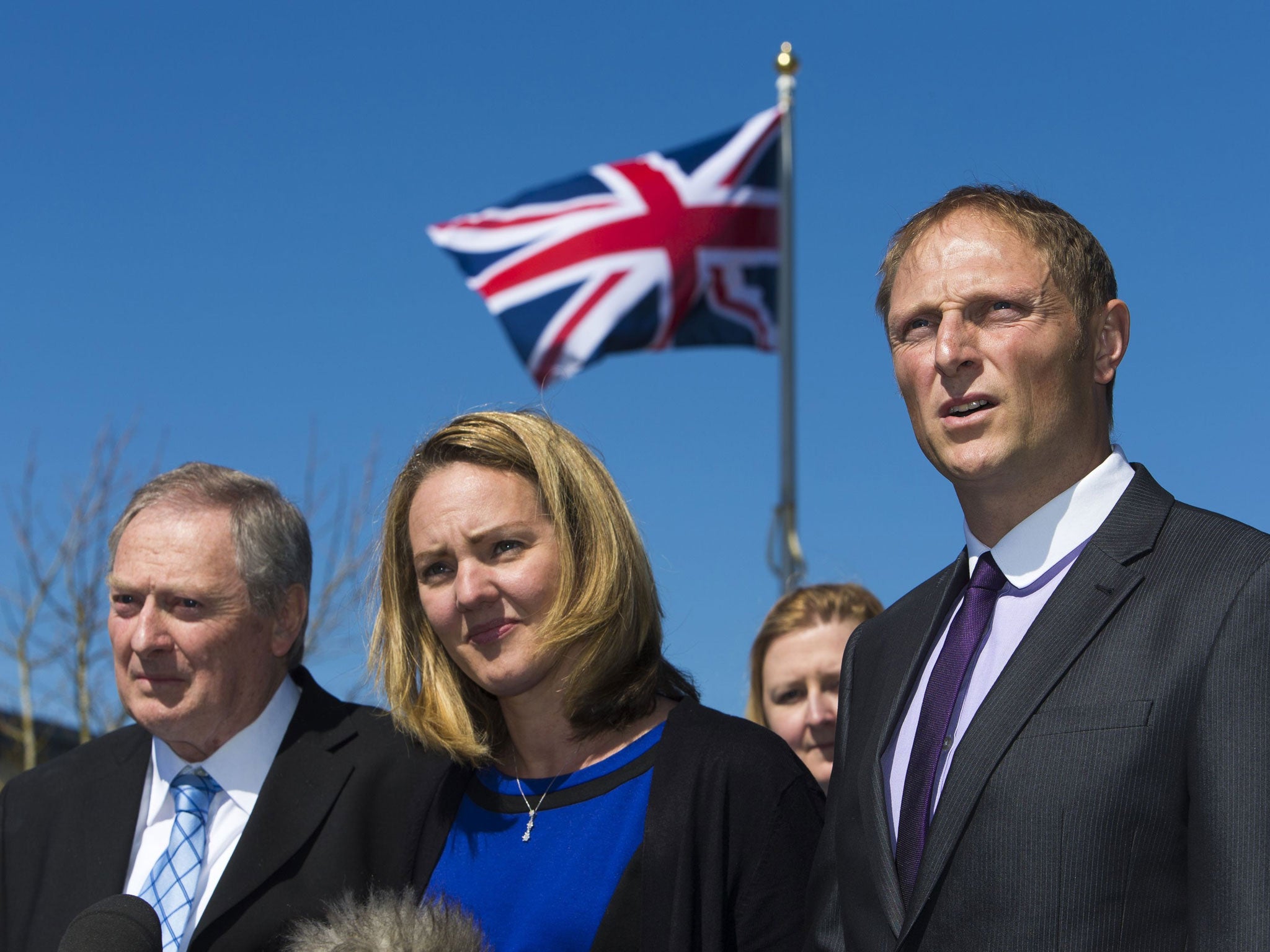 Danny Nightingale (right) with his wife and father