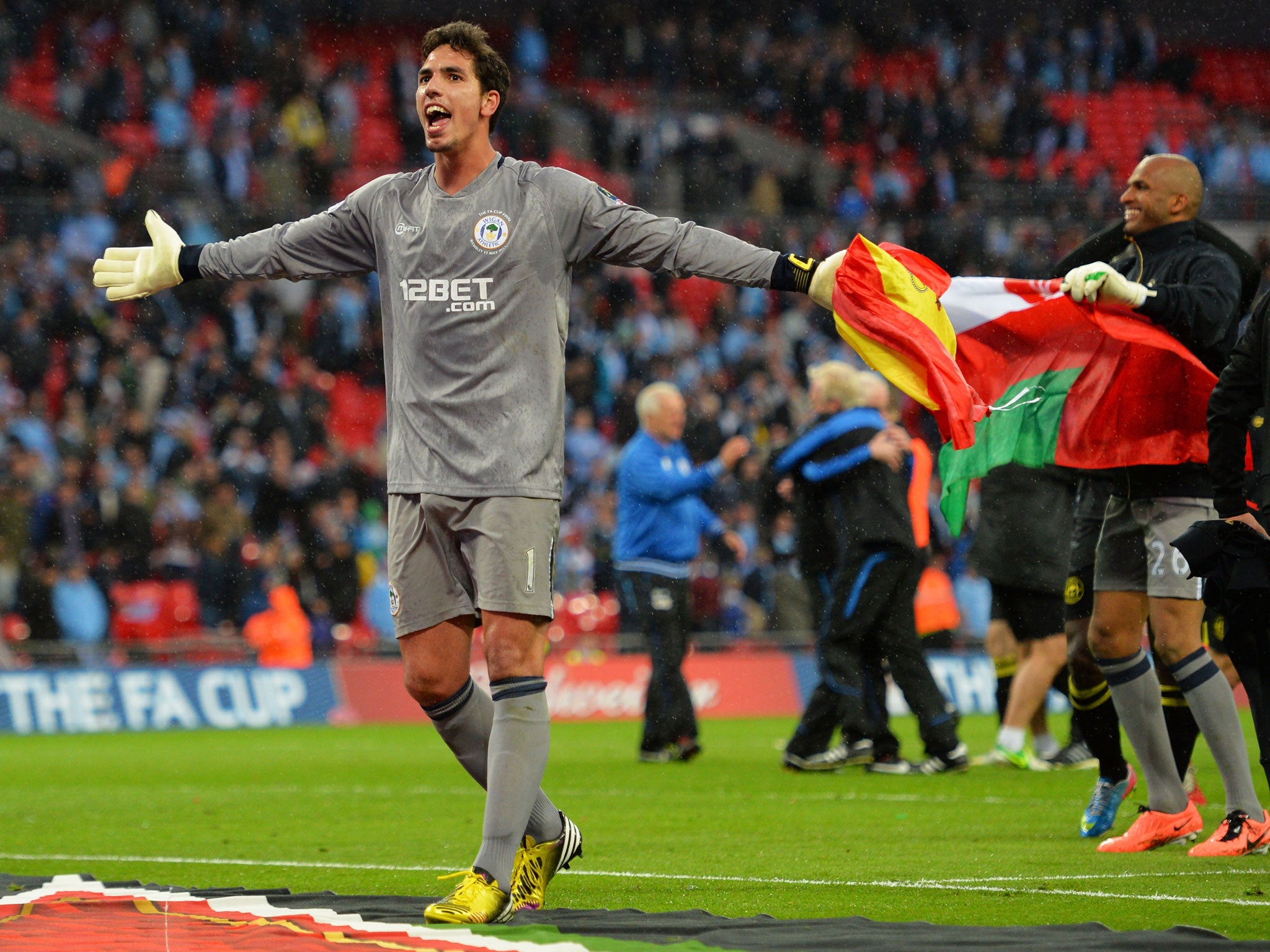 Joel Robles of Wigan Athletic celebrates victory