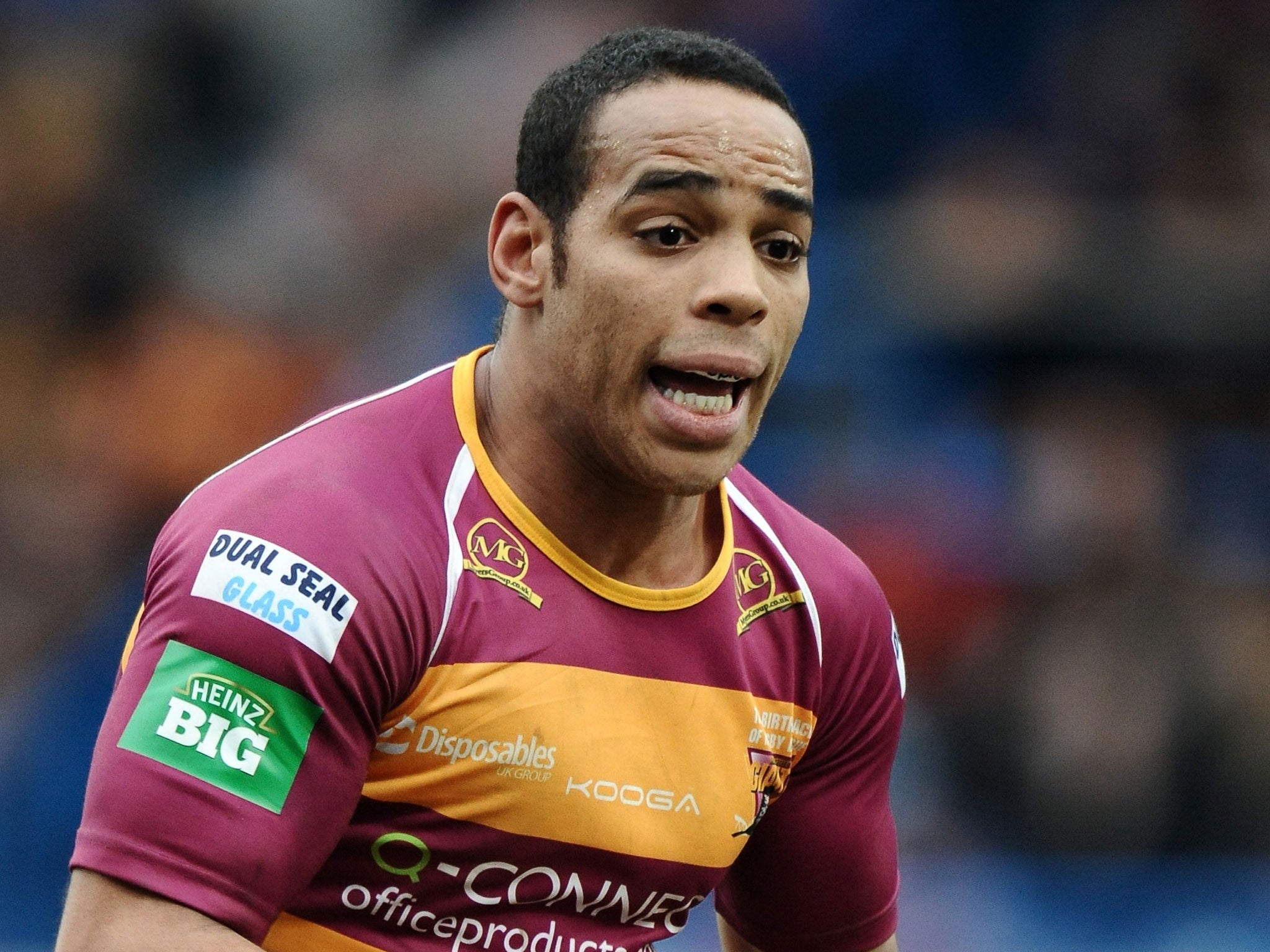 Giant strides: Leroy Cudjoe scored two tries to put Huddersfield through