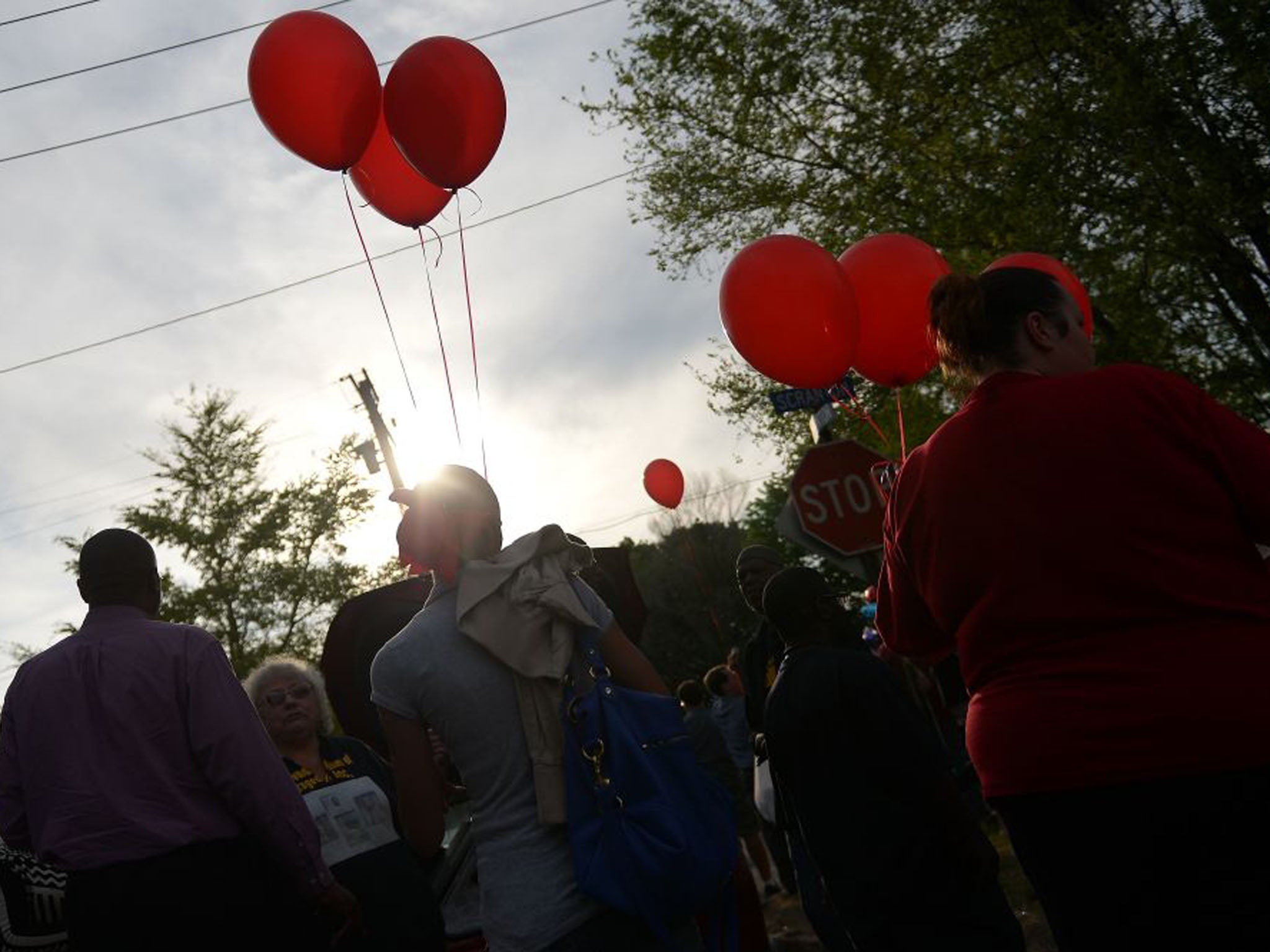Residents gather outside a community meeting at Immanuel Lutheran Church, Cleveland, which was held to talk about the kidnapping