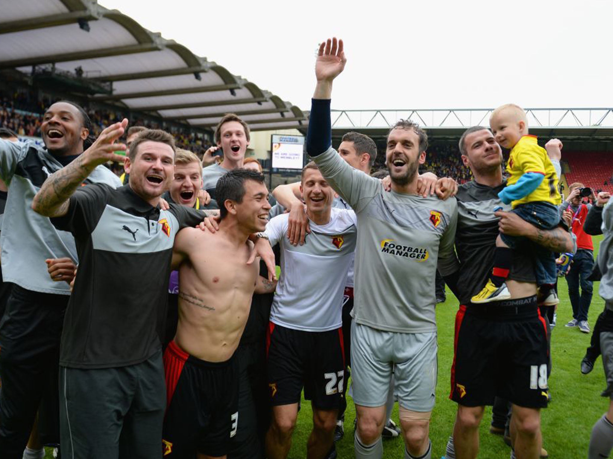 Watford players celebrate the dramatic win that sends them to the play-off final at Wembley Stadium