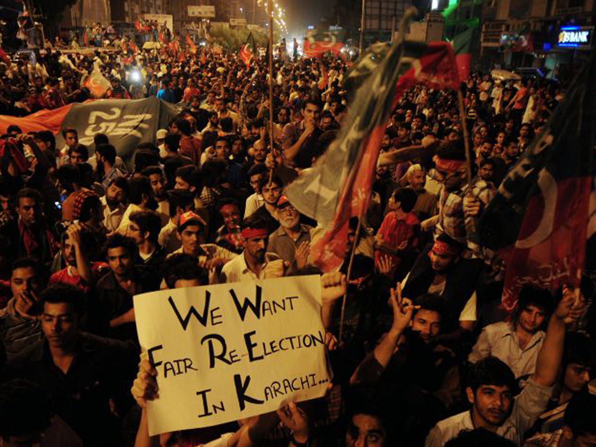 Supporters of Imran Khan stage a protest against the vote rigging in Karachi yesterday (Asif Hassan/AFP/Getty Images)