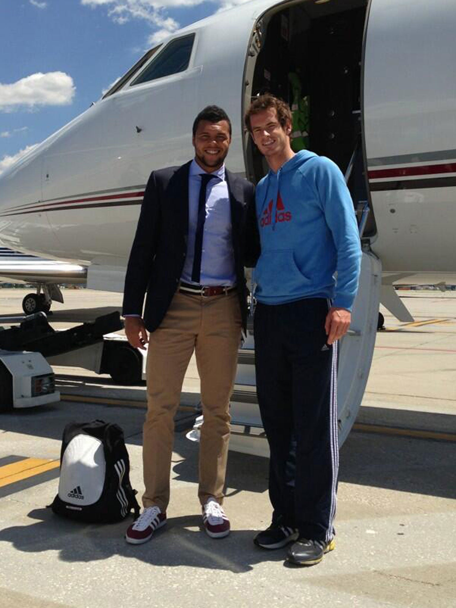 Jo-Wilfried Tsonga and Andy Murray about to board the jet