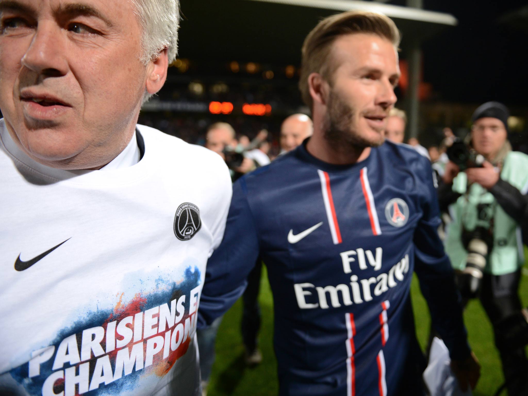 Carlo Ancelotti and David Beckham celebrate PSG's Ligue 1 win