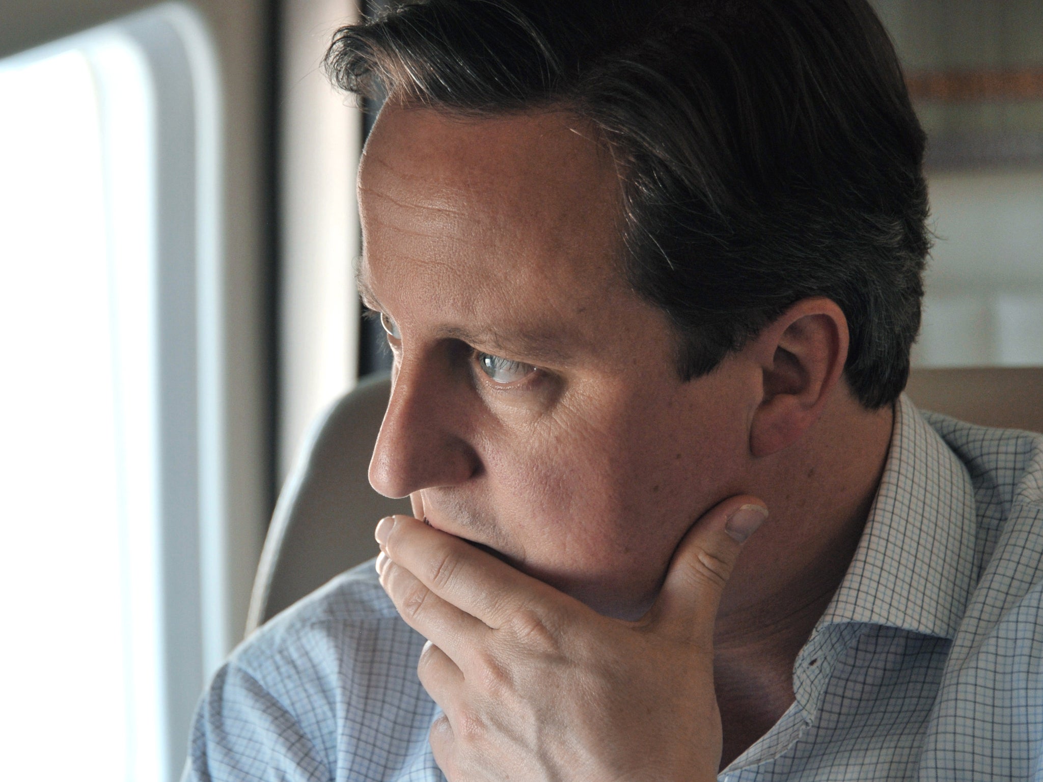 David Cameron has flown to Washington for talks with President Barack Obama