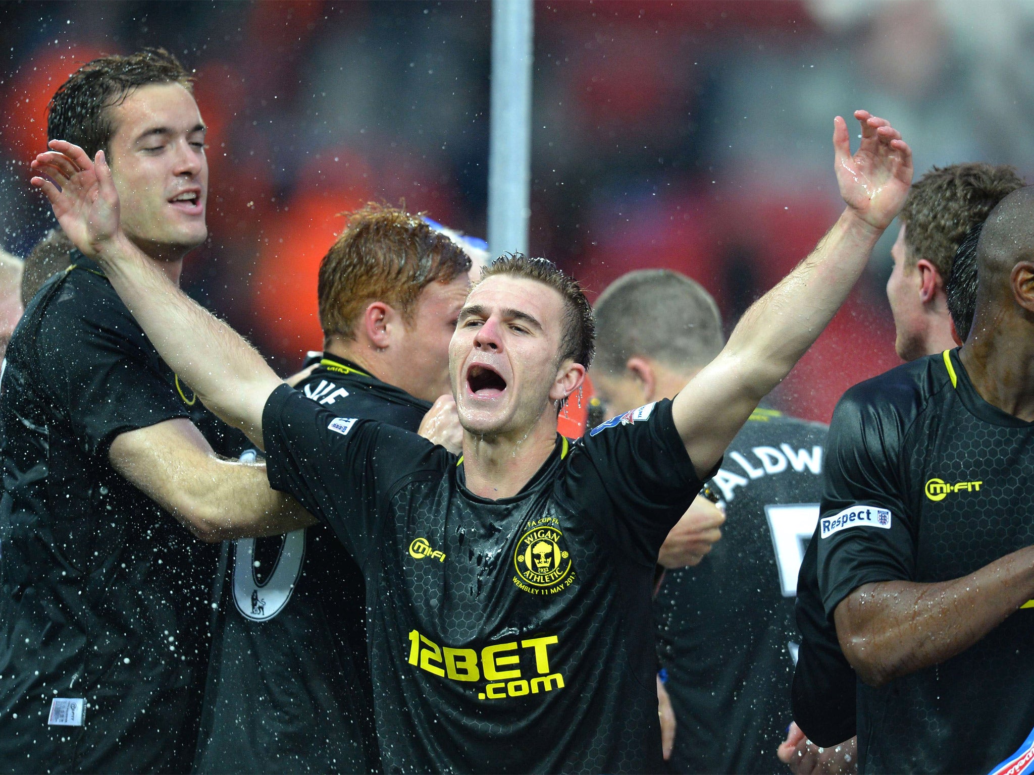 Callum McManaman celebrates Wigan’s FA Cup victory on Saturday