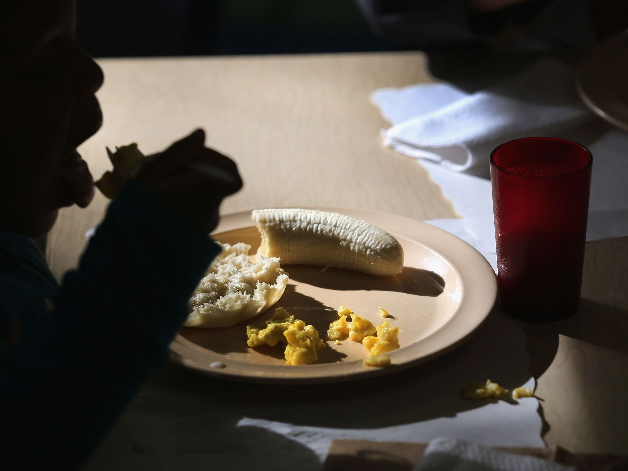 Children eat breakfast at the federally-funded Head Start Program school on September 20, 2012 in Woodbourne, New York. The school provides early education, nutrition and health services to 311 children from birth through age 5 from low-income families in Sullivan County, one of the poorest counties in the state of New York.