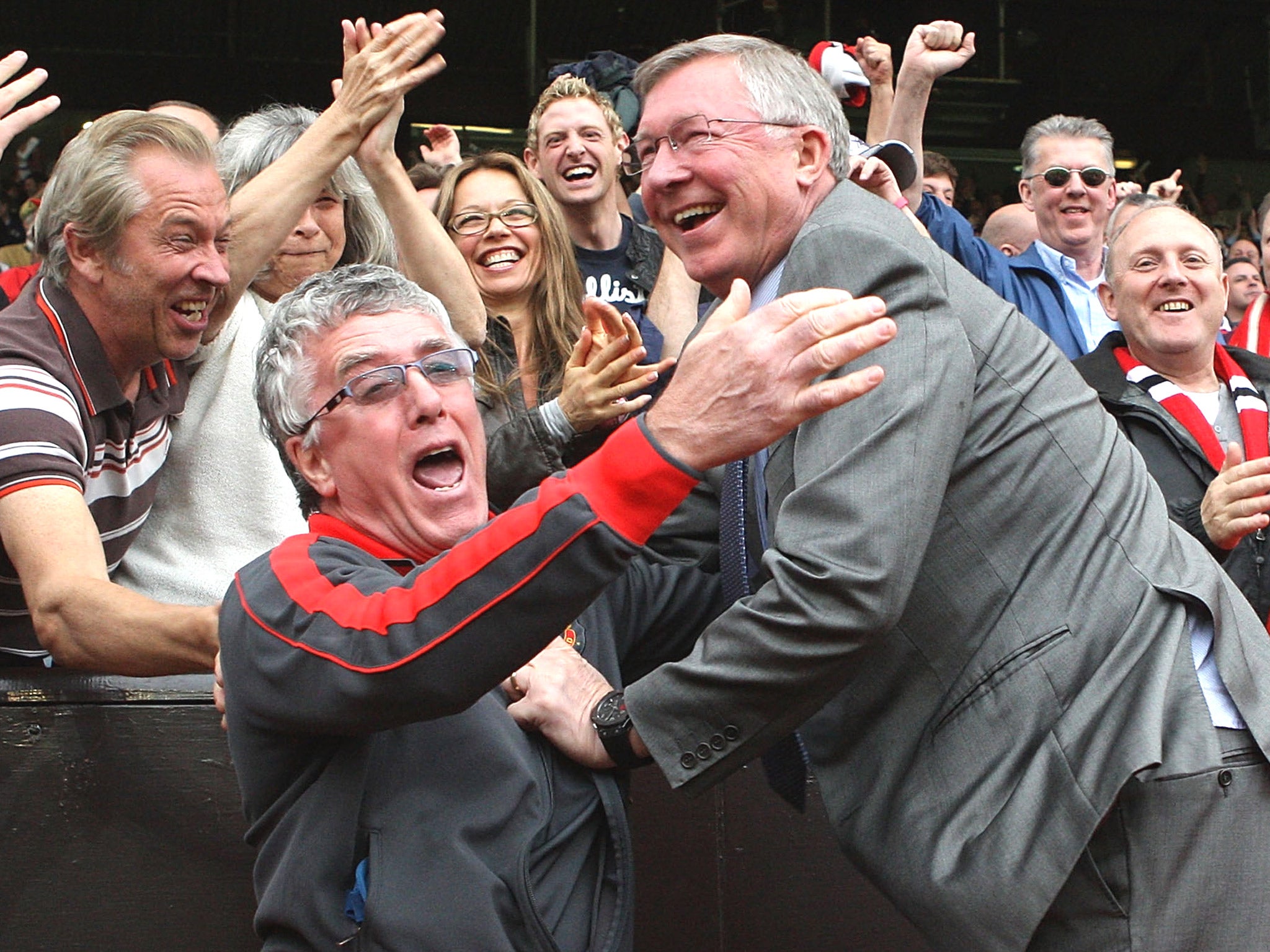 Kit man Albert Morgan celebrates with main man Fergie