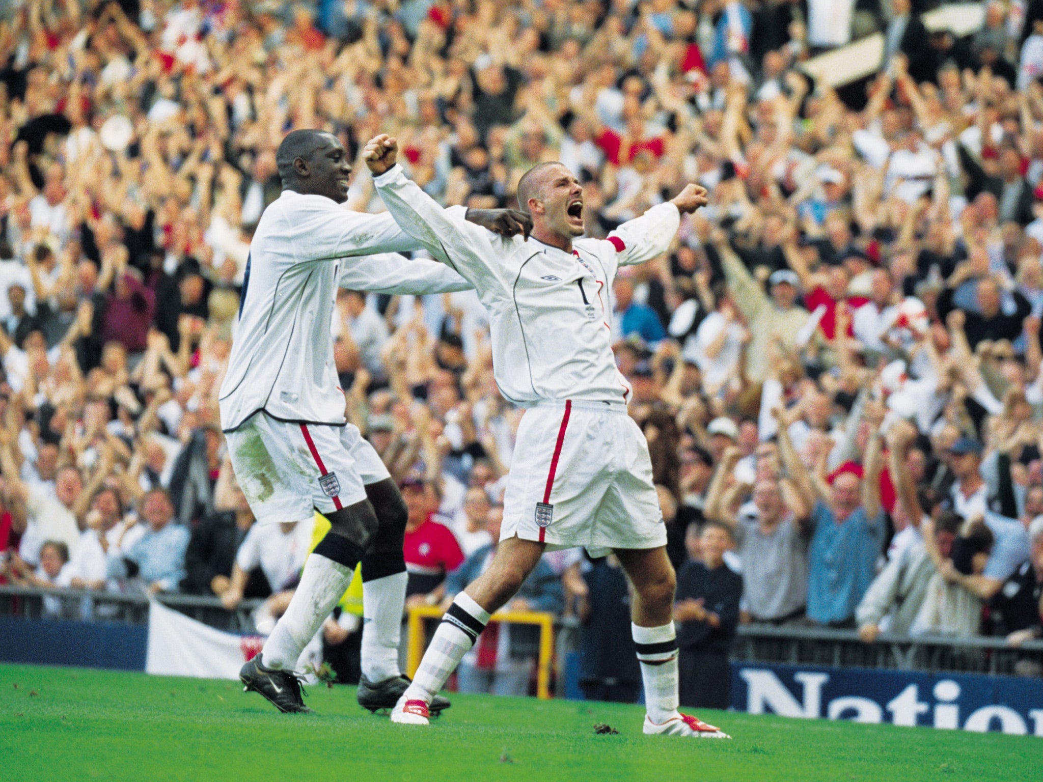 David Beckham celebrates after scoring against Greece in 2001