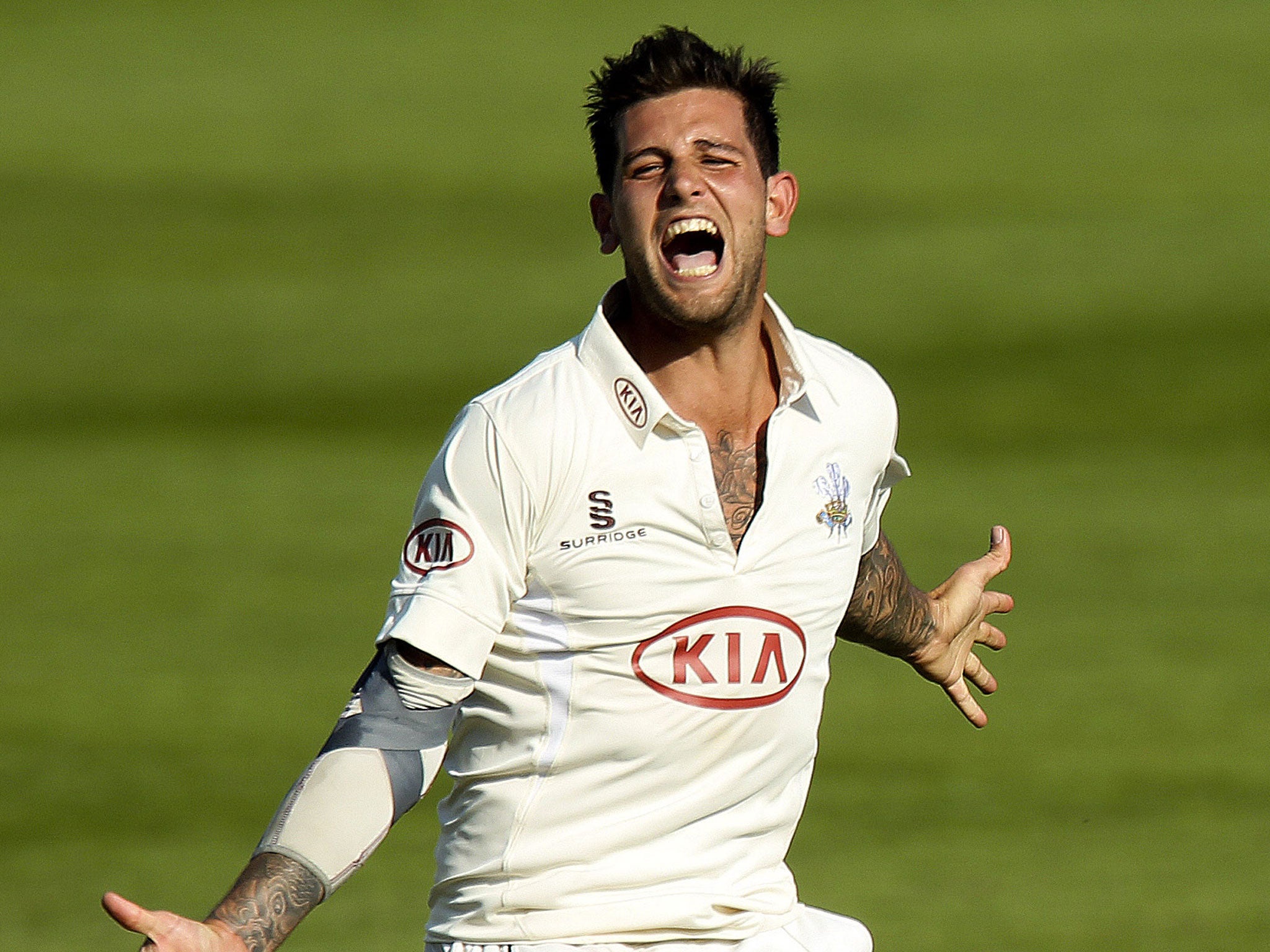 Jade Dernbach took three wickets but Surrey spilt four catches