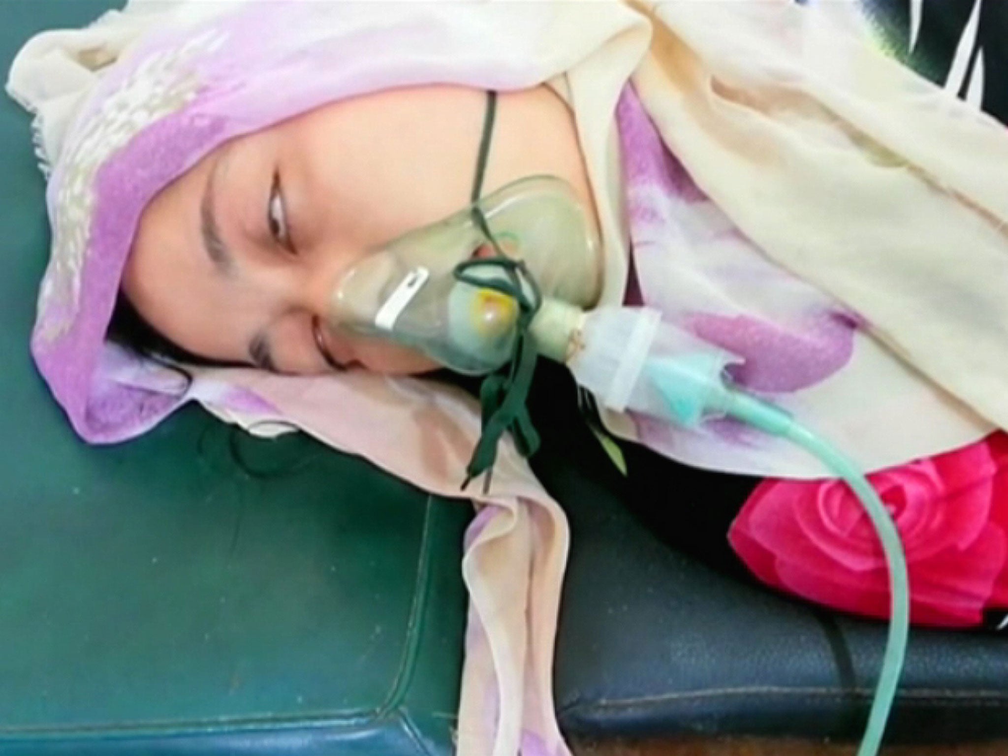 Television image of Maryam Khatib after the alleged gas attack. She later died
