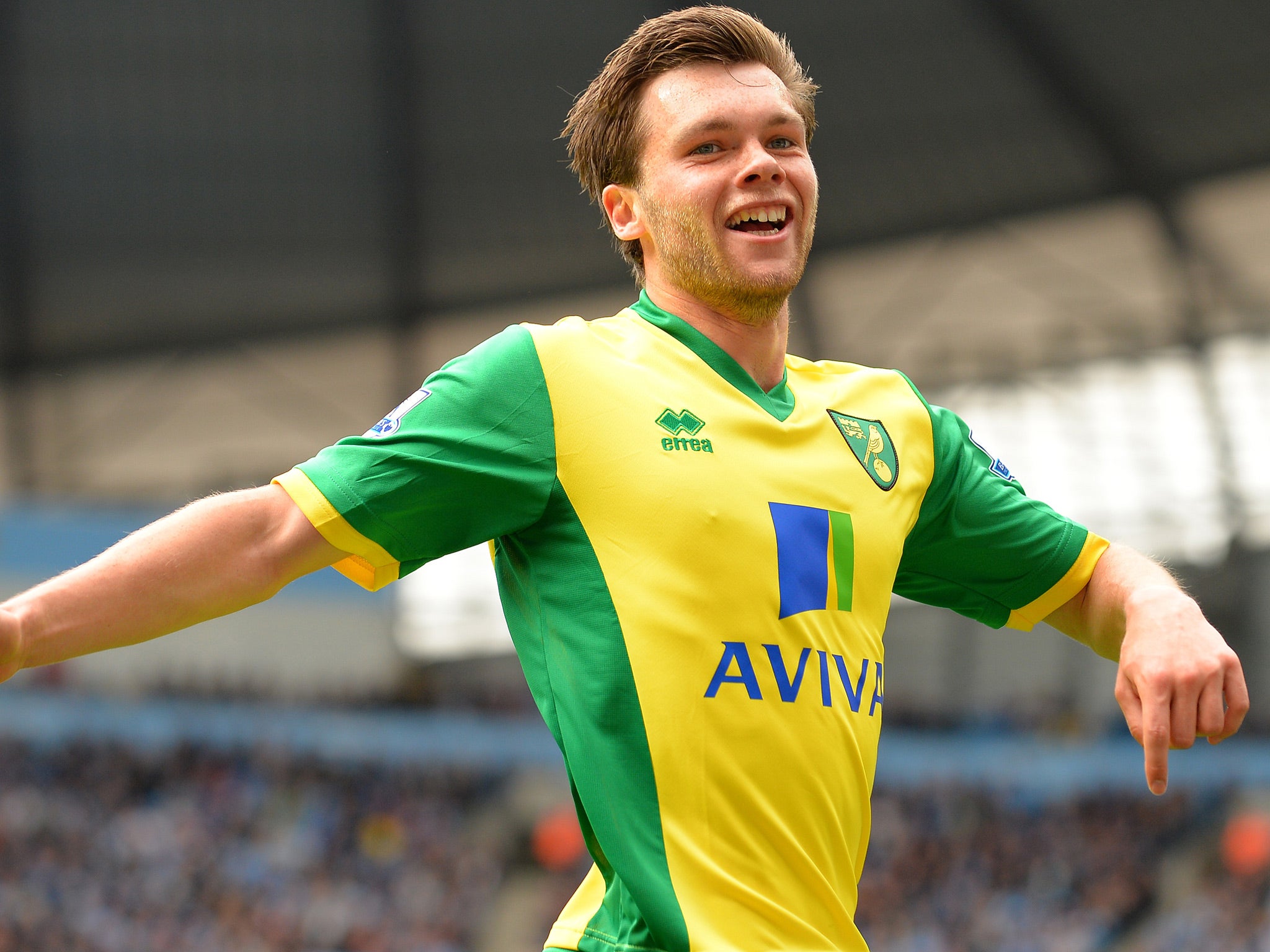 Jonny Howson celebrates his winner for Norwich at the Etihad