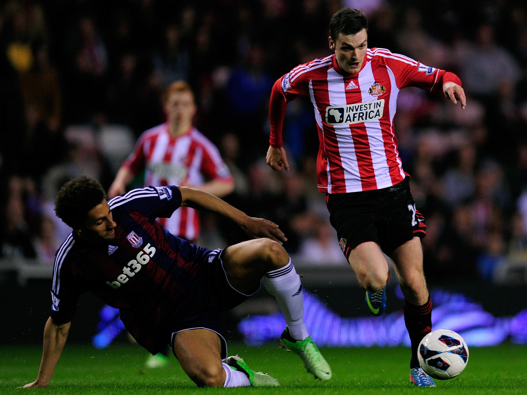 Adam Johnson evades Stoke's Ryan Shotton