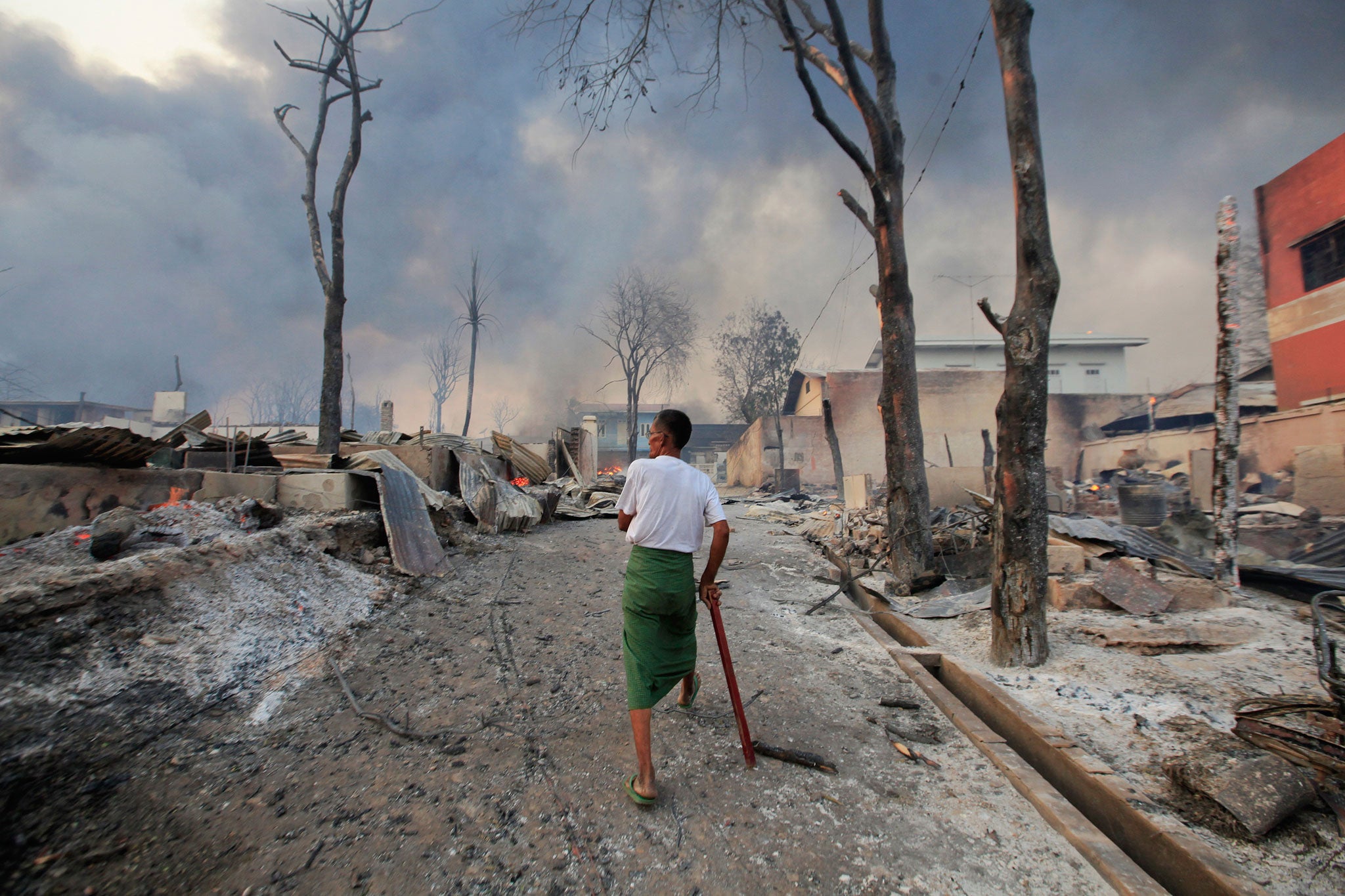 Devastated: Ethnic violence, from the burning of houses to horrific executions, has spread across Burma in a racial backlash against Muslims