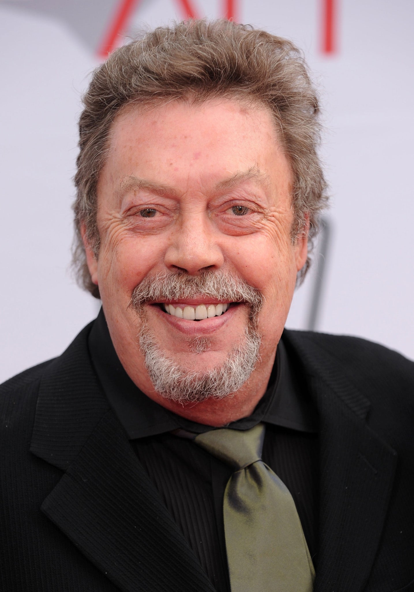 Tim Curry is recovering at home after suffering a stroke