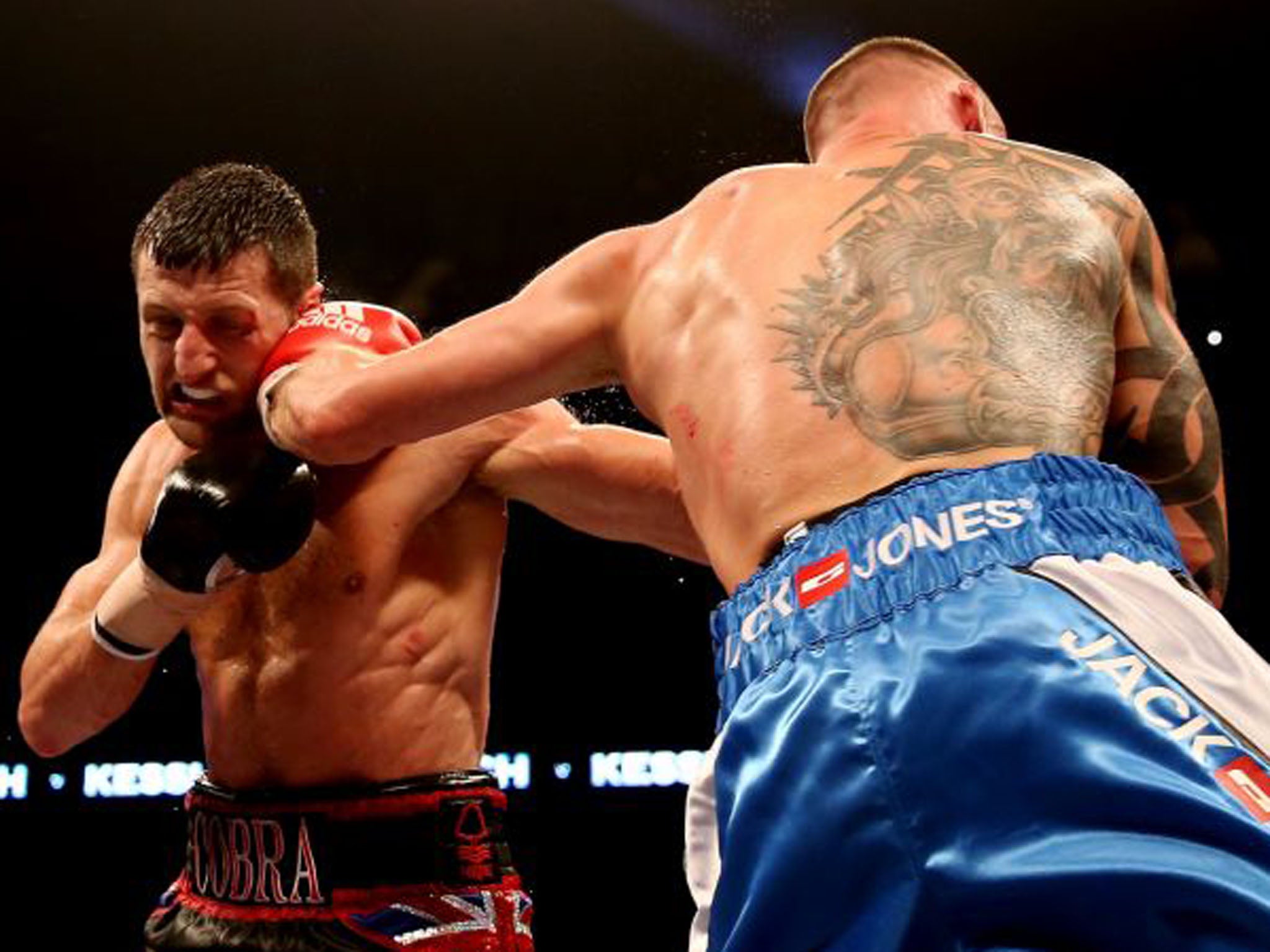 Froch takes a punch from Kessler during the bout