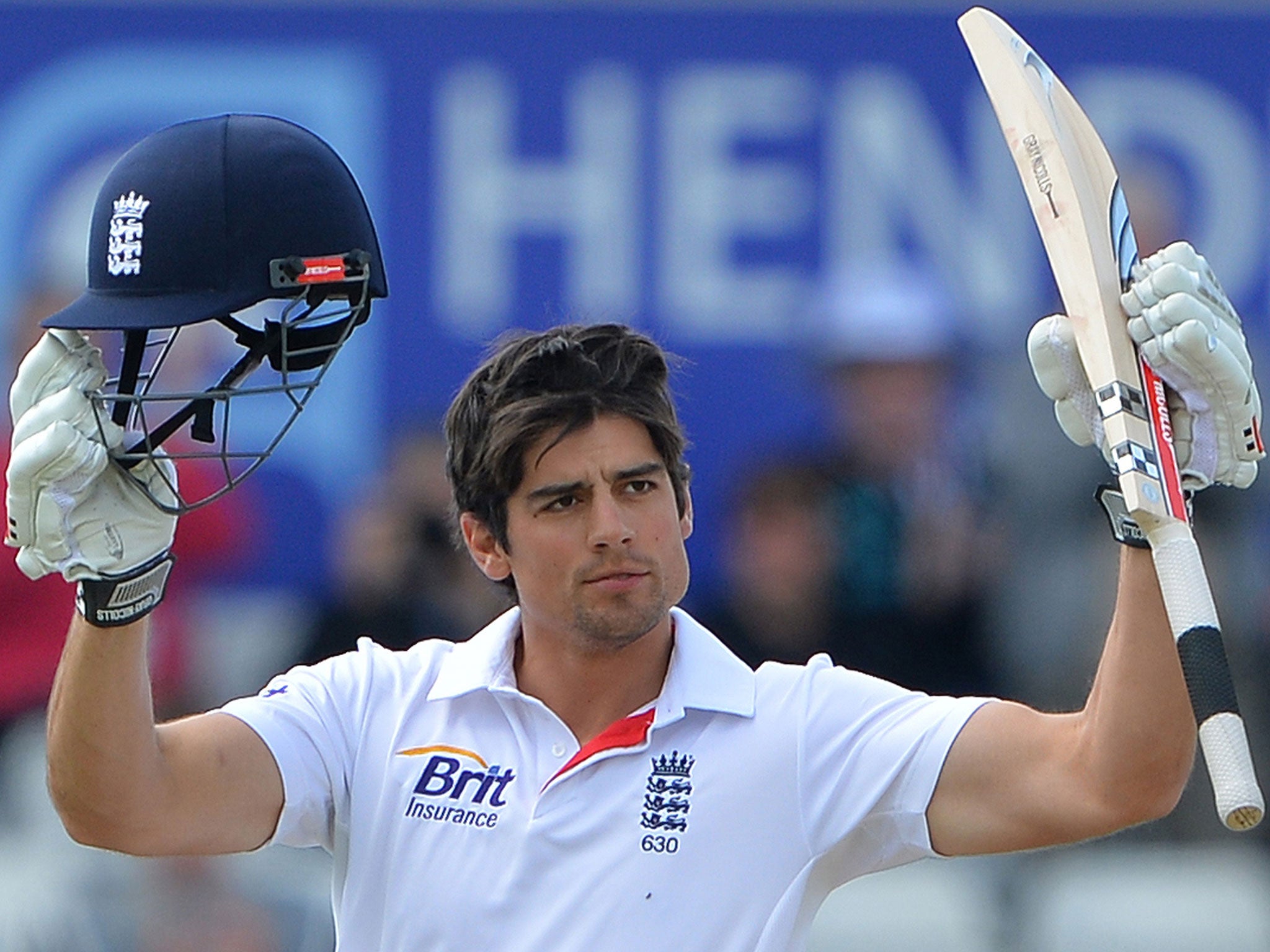 The England captain, Alastair Cook, celebrates his century