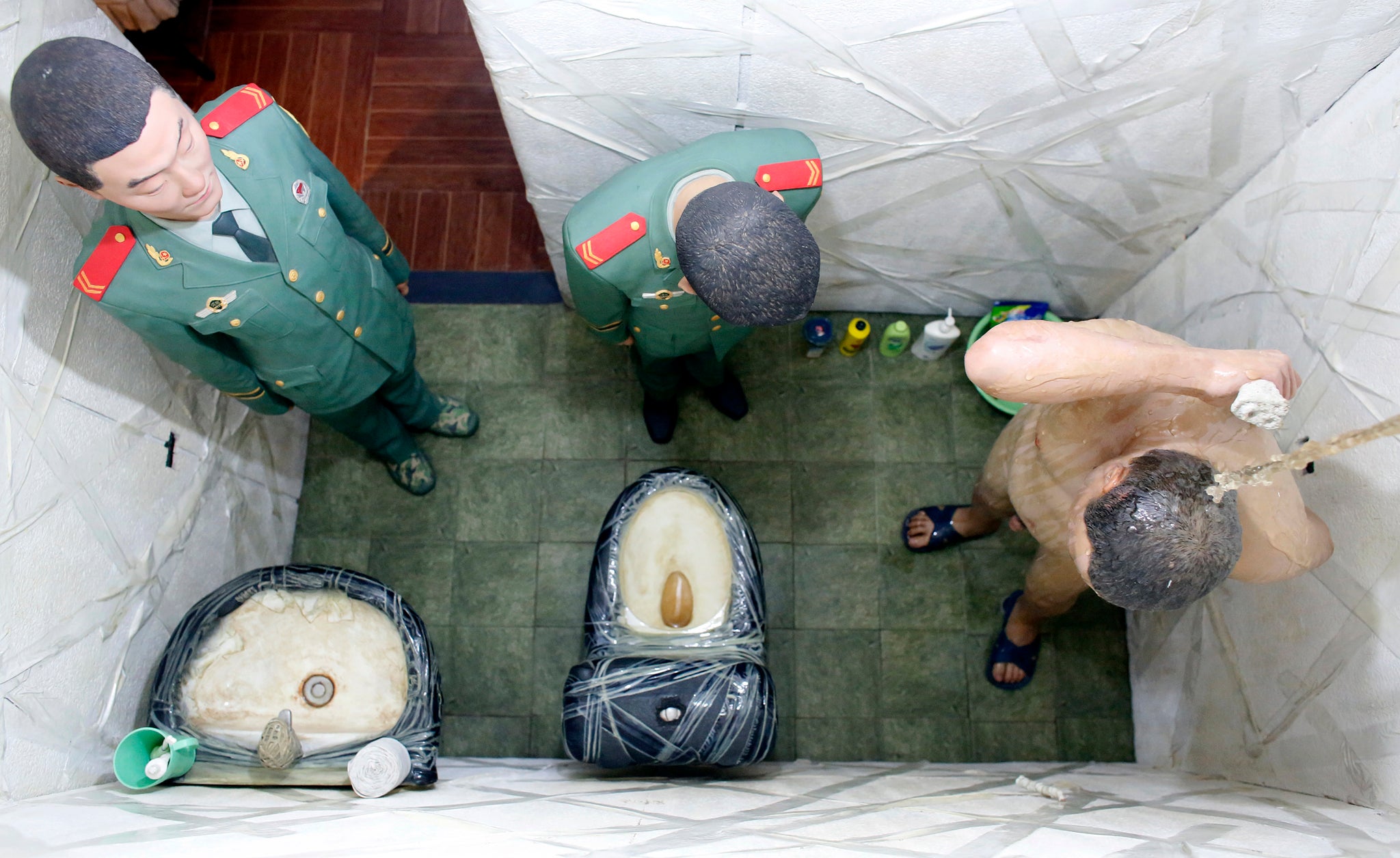 A view of an installation as part of the 'S.A.C.R.E.D' exhibition by Chinese artist Ai Weiwei during the 55th La Biennale of Venice, in the church of Sant'Antonin in Venice May 28, 2013. The exhibition, which runs till September 15, is made up of installations depicting dissident artist Weiwei's 81-day detention in 2011.