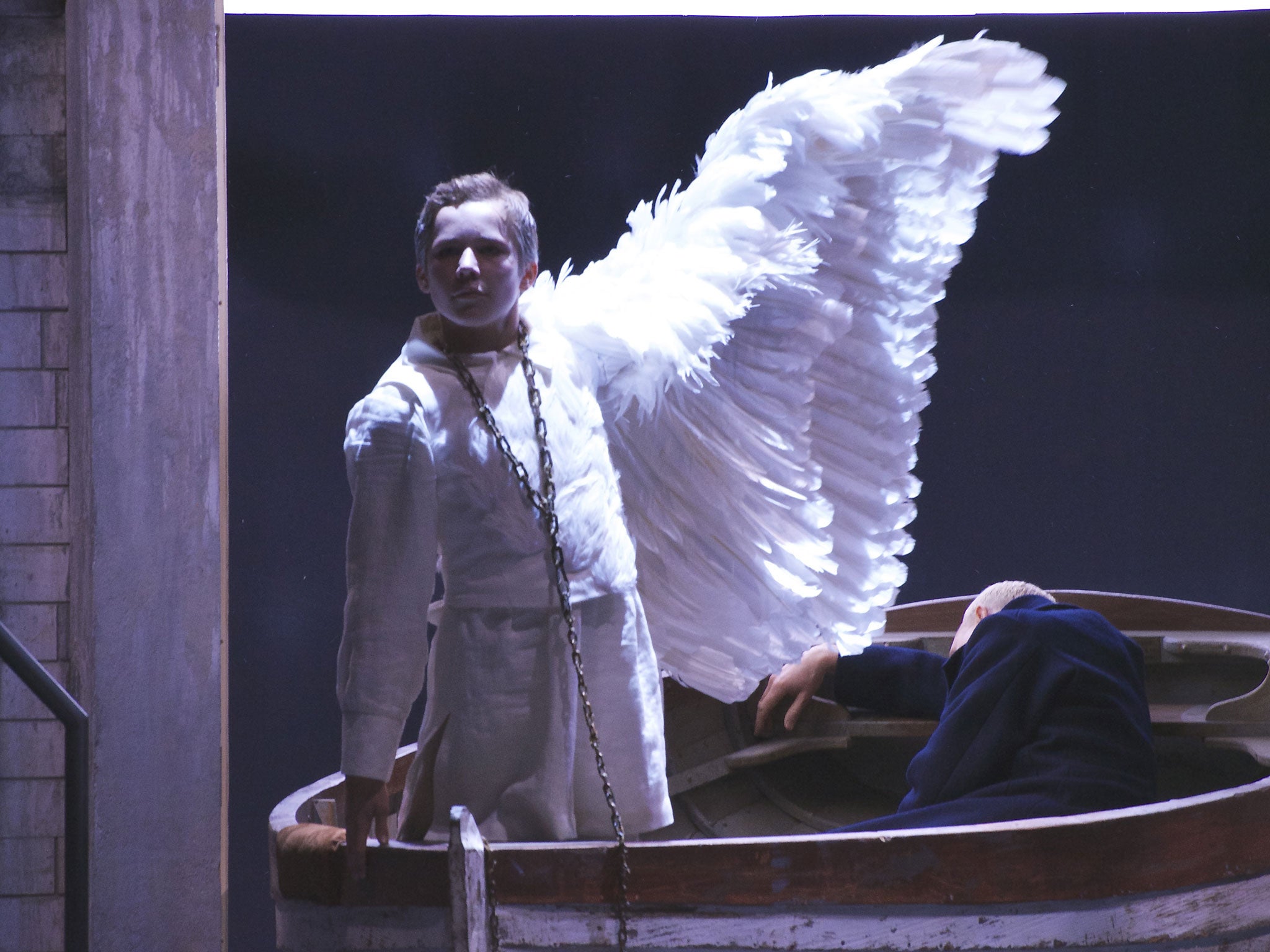 Winging it: Peter Wedd as Lohengrin is propelled across the water by Thomas Rowlands as Gottfried