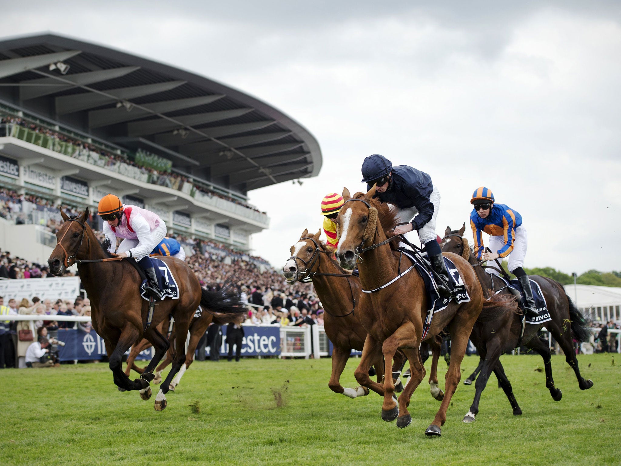 Ryan Moore drives Ruler Of The World (second from right) home