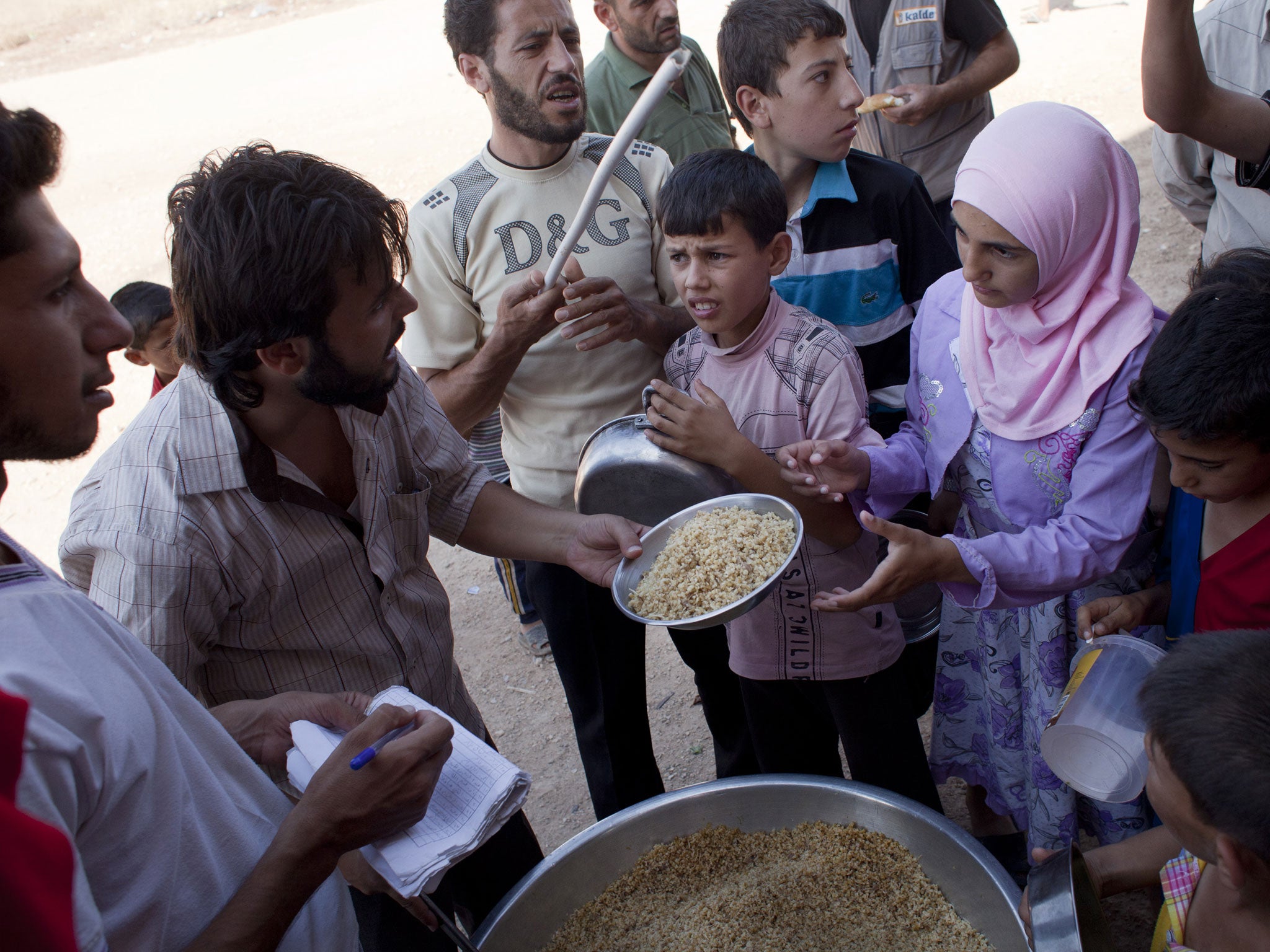 Refugees on the Turkish border; charities warn they need more support