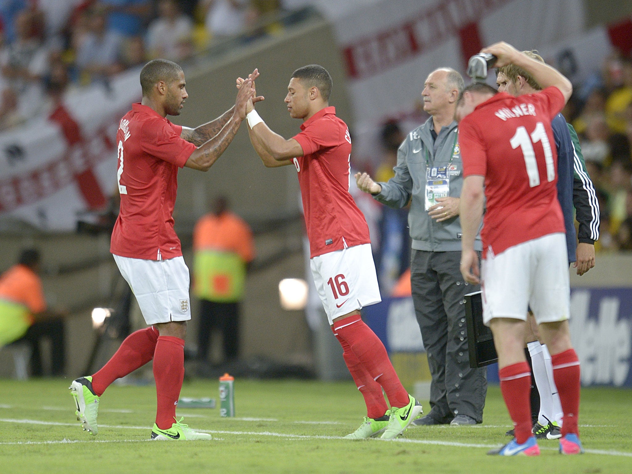 Alex Oxlade-Chamberlain, centre, replaces Glen Johnson, left