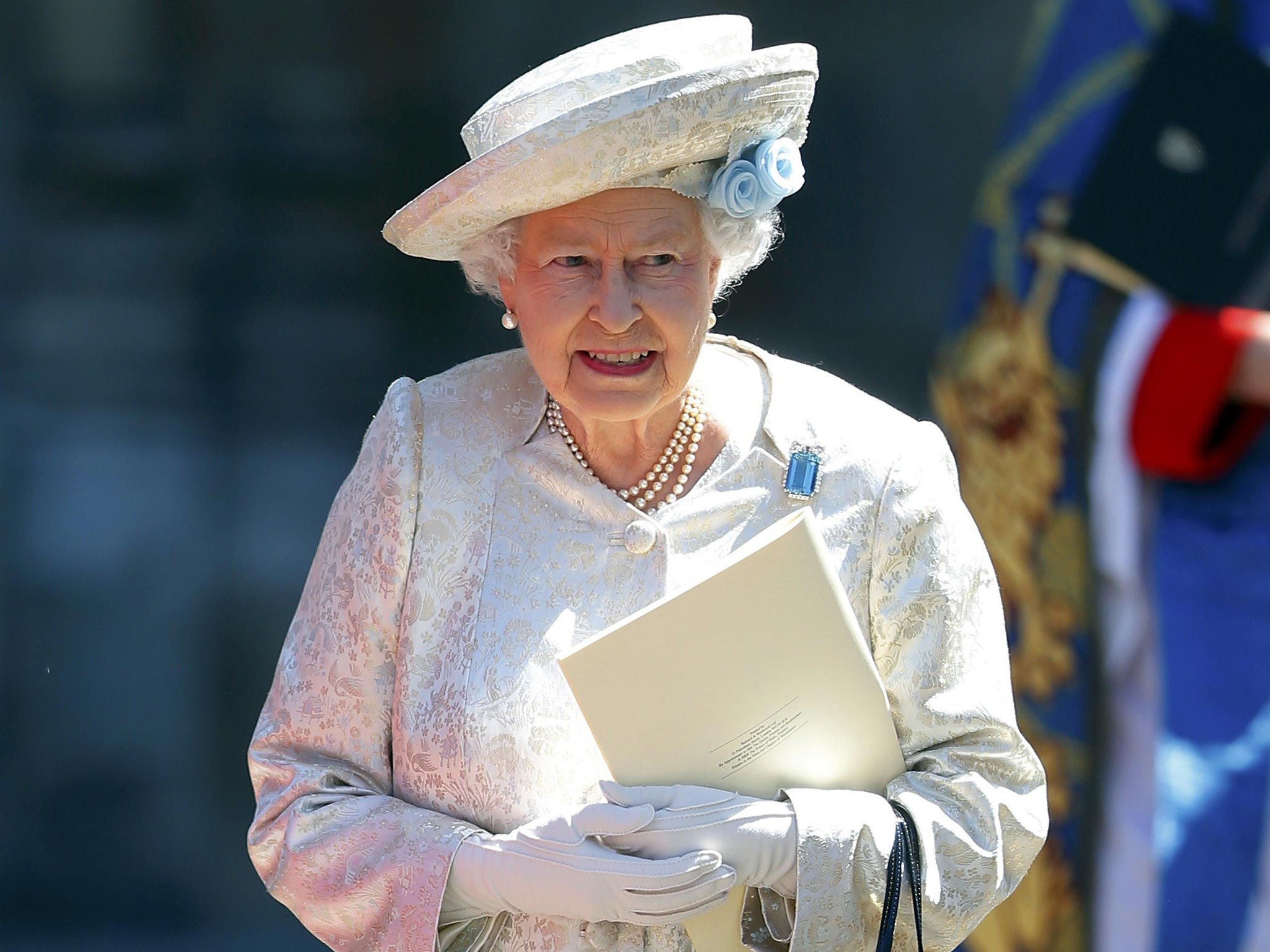 Britain's Queen Elizabeth leaves Westminster Abbey after celebrating the 60th anniversary of her coronation in London