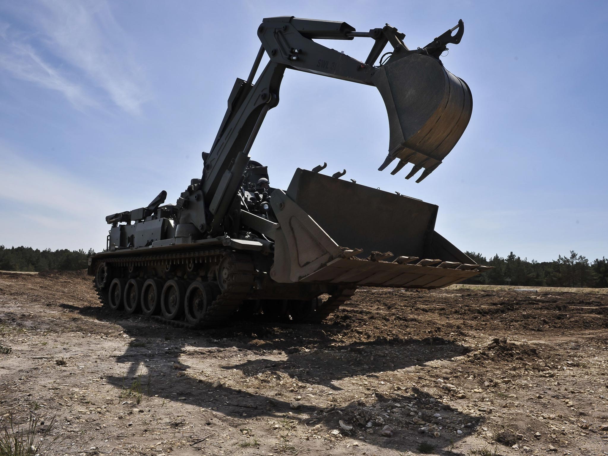 A Terrier armoured digger, which can be controlled by remote control during an unveiling at the Defence Armoured Vehicle Centre, Bovington, Dorset. PRESS ASSOCIATION Photo. Picture date: - PA