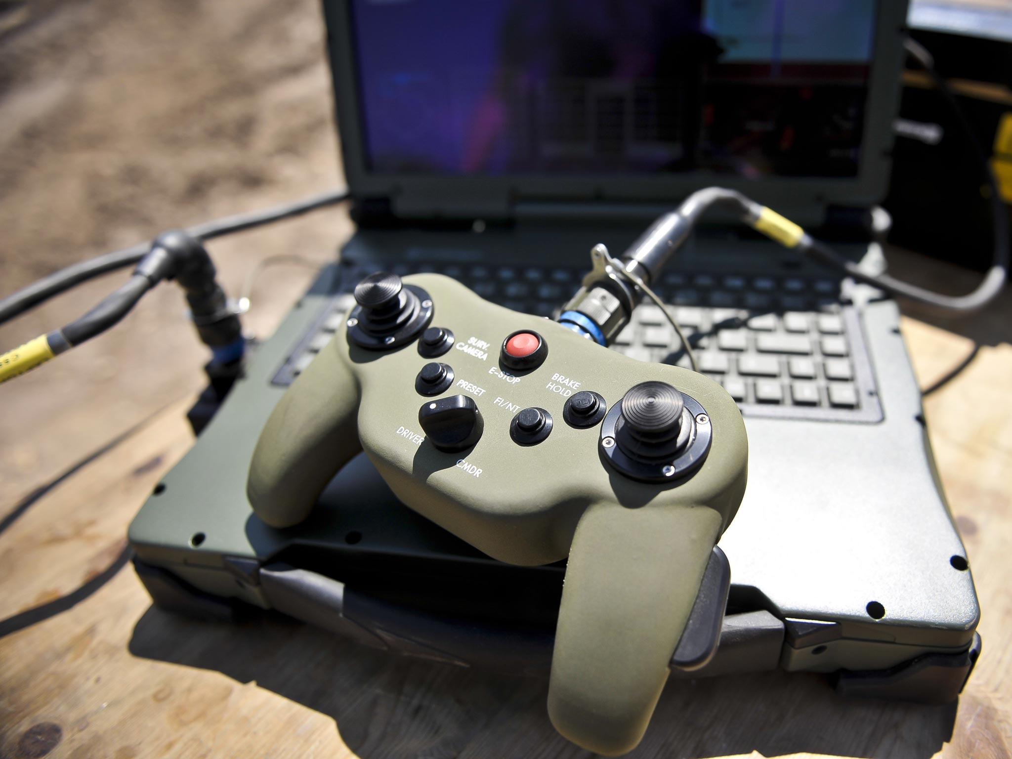 The laptop and games console style controller used to control a Terrier armoured digger, which can be controlled by remote control during an unveiling at the Defence Armoured Vehicle Centre, Bovington, Dorset. - PA
