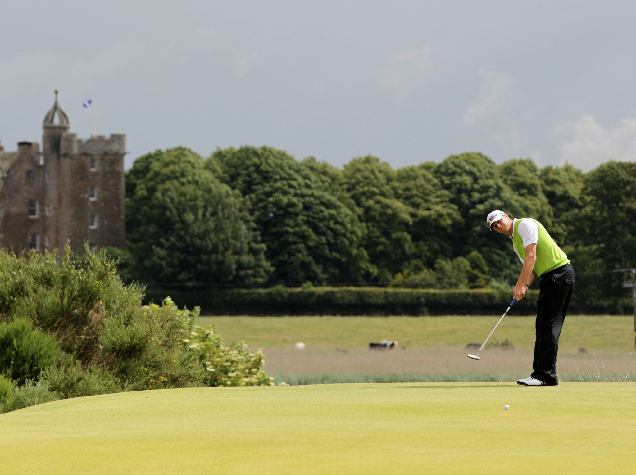 Fredrik Andersson Hed of Sweden putts on the 3rd green during the final round of the Aberdeen Asset Management Scottish Open at Castle Stuart Golf Links on July 15, 2012 in Inverness, Scotland.