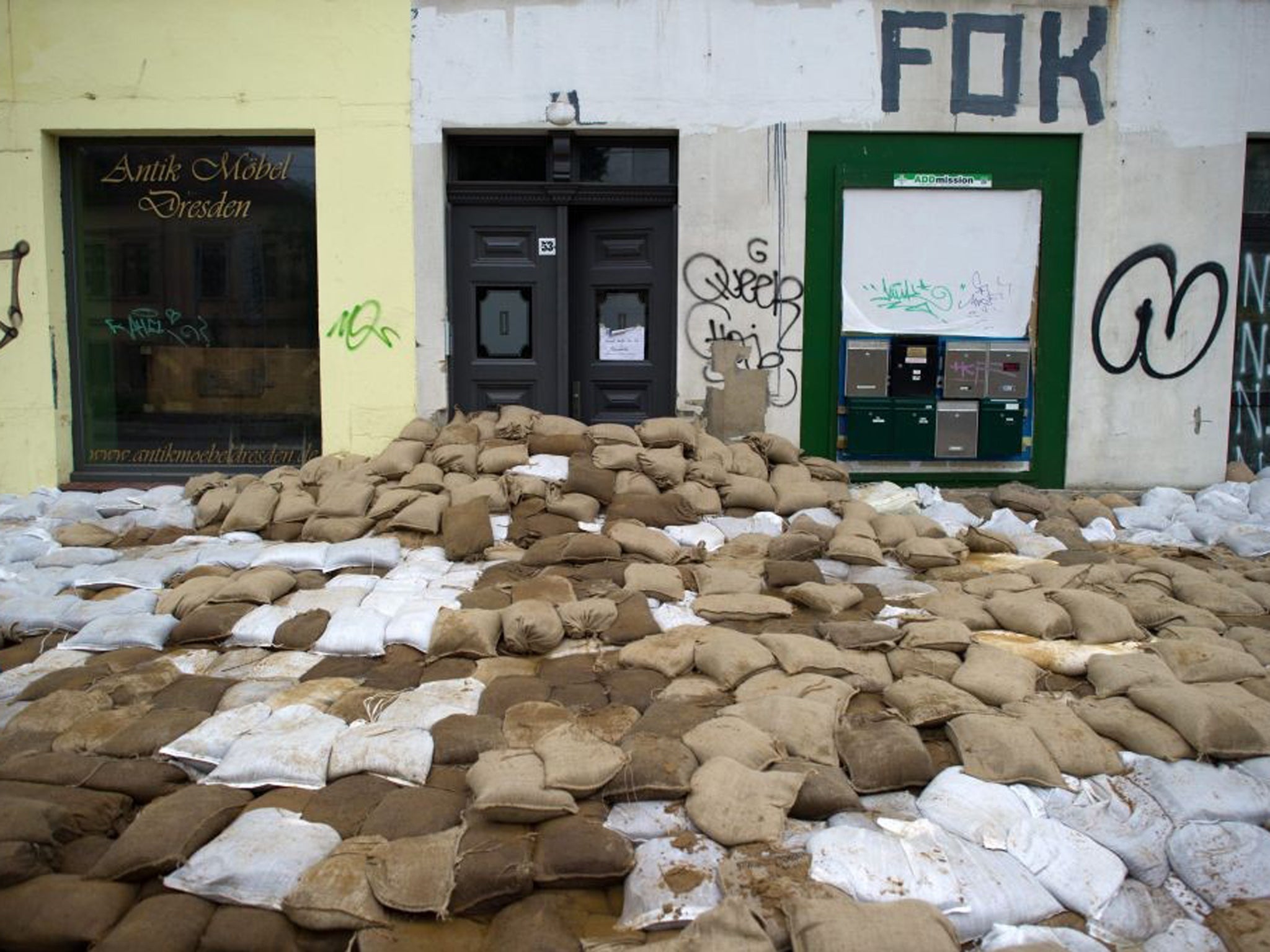 Sandbags protect a premises against the flood in Dresden, Germany, on 6 June 2013. Today's flood crest is likely to be the biggest test yet of its floodwalls since 2002 when the Elbe River inundated historic palaces