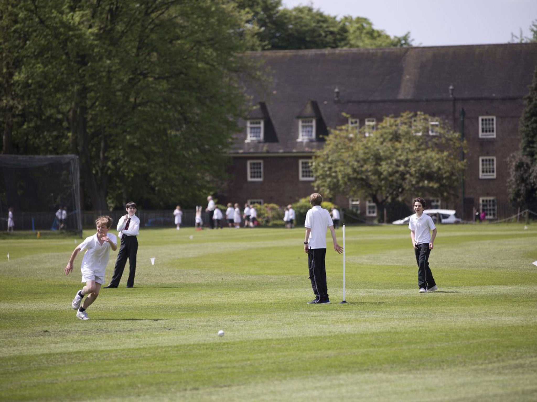Liverpool College pupils playing rounders