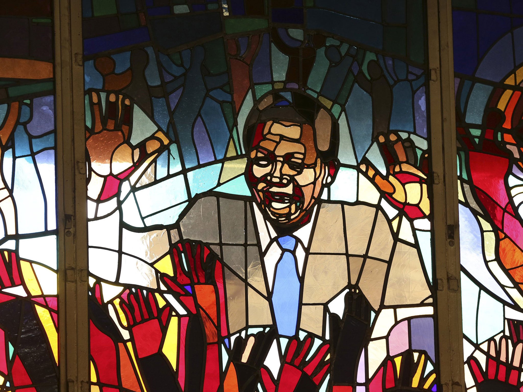 A mural of former South African president Nelson Mandela is seen at Regina Mundi church in Soweto