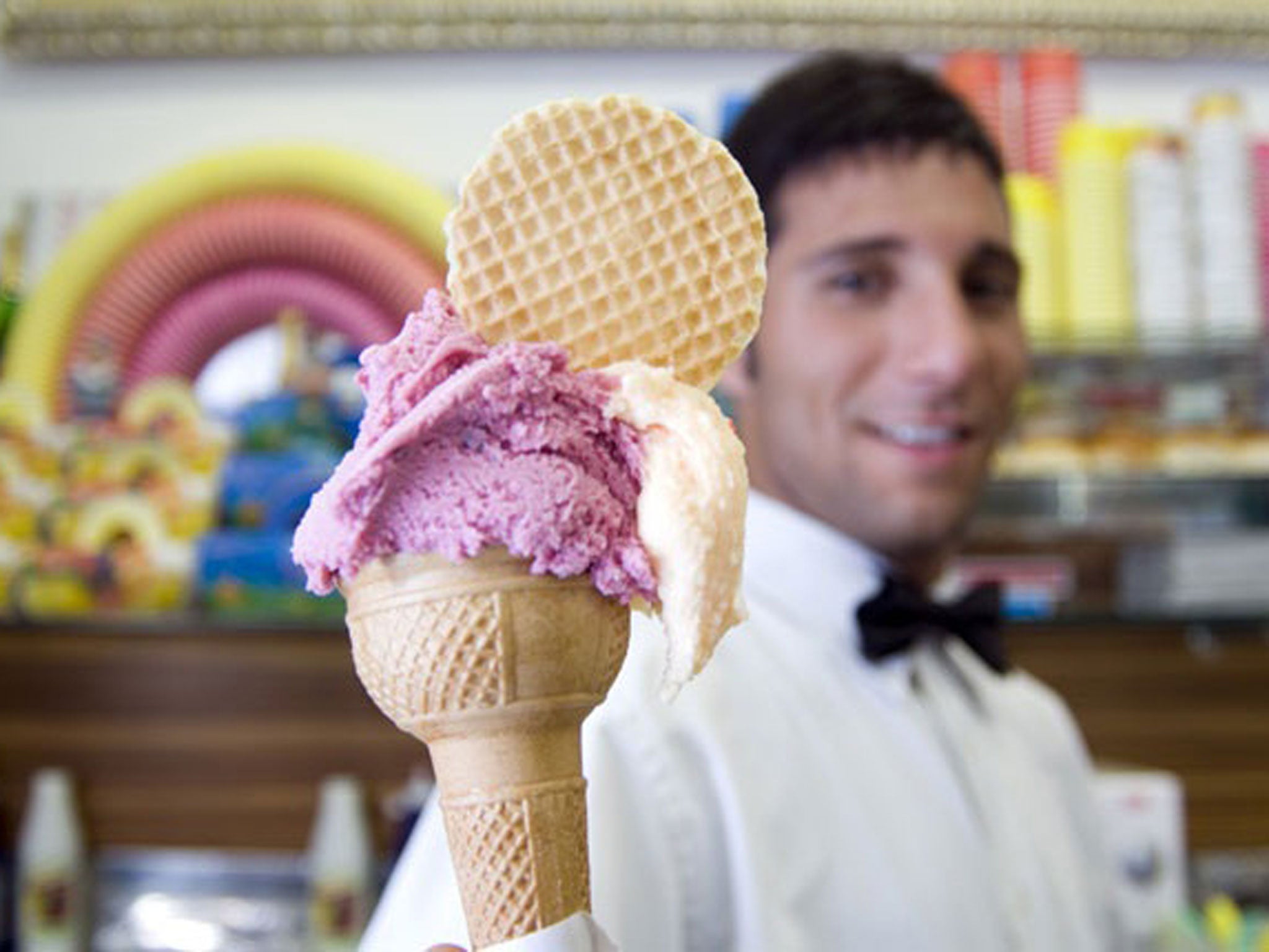 Eating ice cream in the street with friends on a hot summer night is one of Italy’s most affordable pleasures