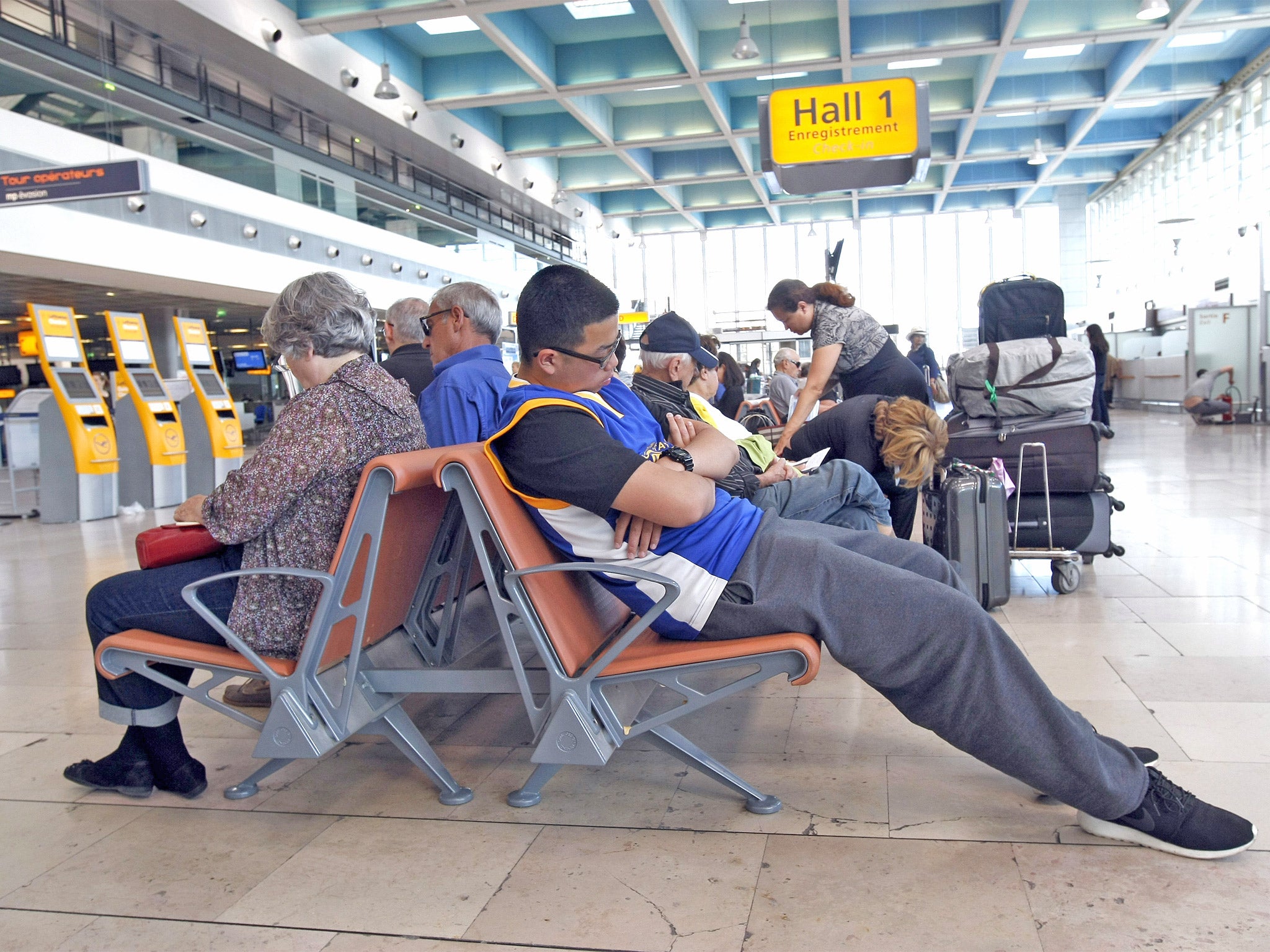 Passengers wait for a flight at Marseille-Provence Airport