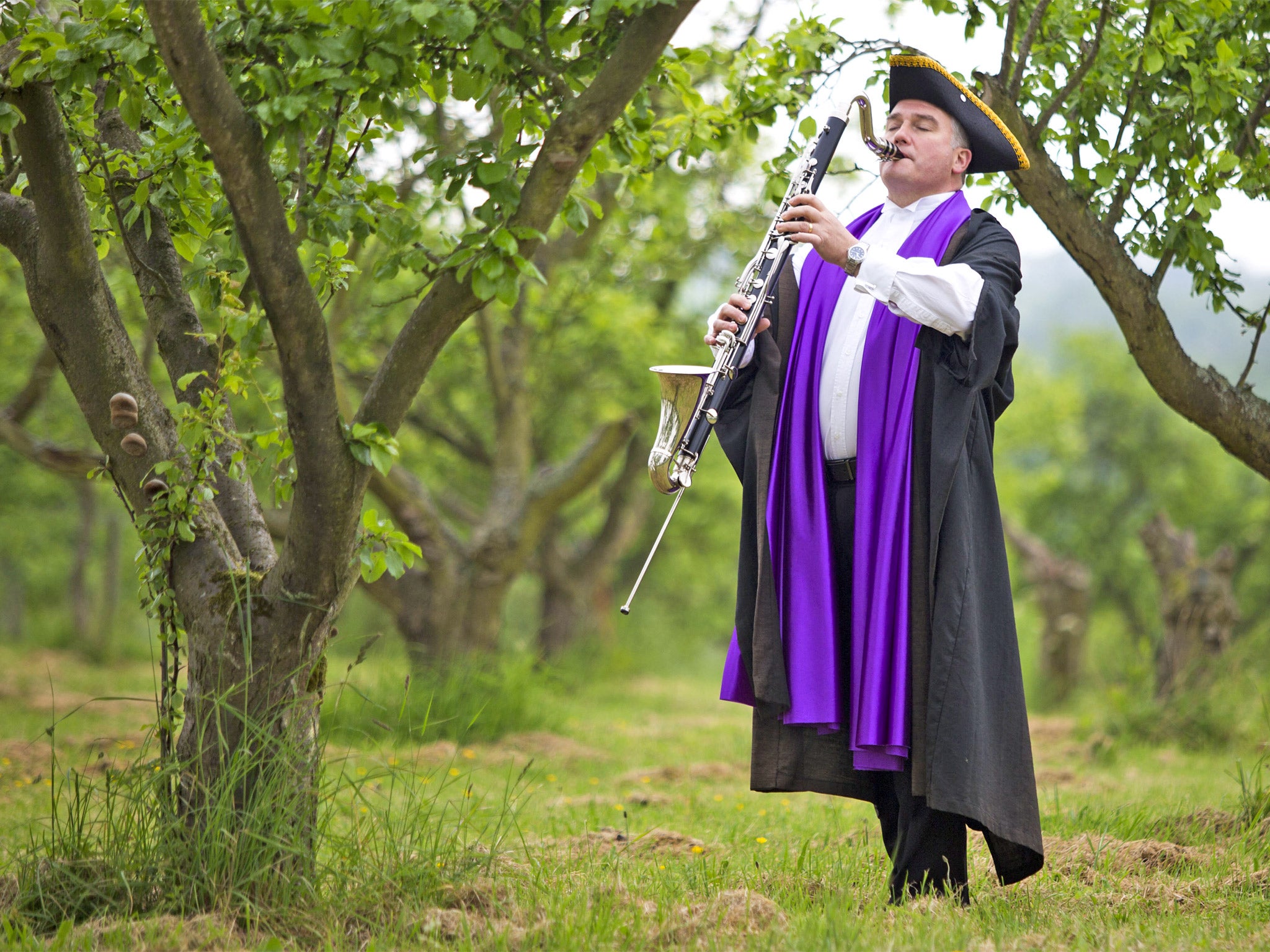 'Plum Charmer' Paul Johnson encourages growth in the Lenches Heritage Orchard near Pershore