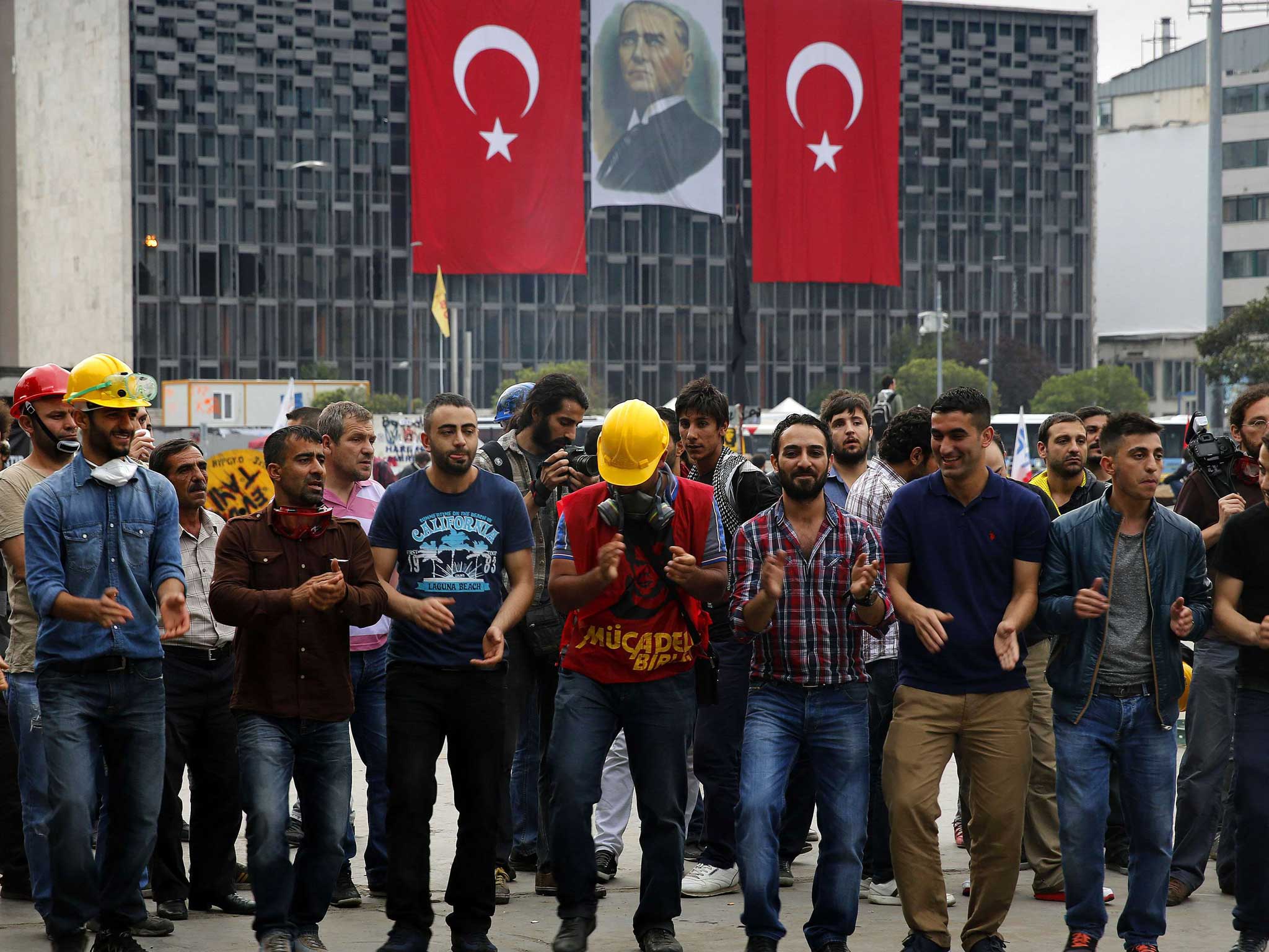 Protesters dance in Gezi park in 2013