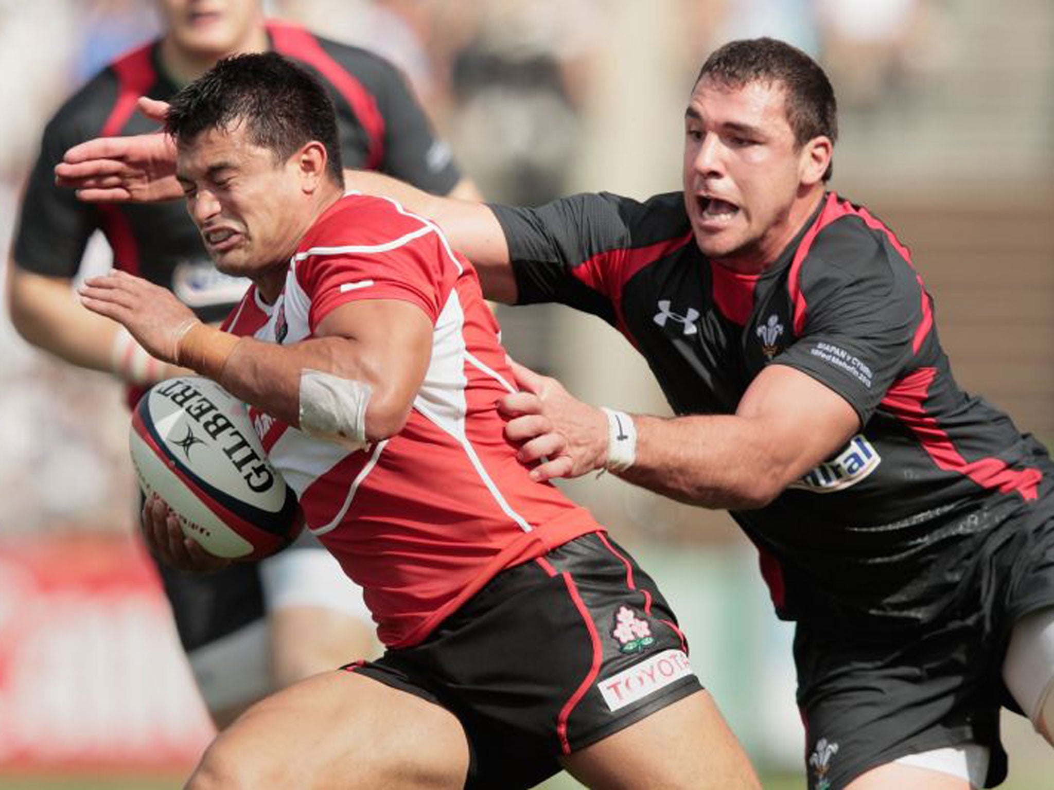 Craig Wing of Japan makes a break during the international friendly between Japan and Wales at Prince Chichibu Stadium