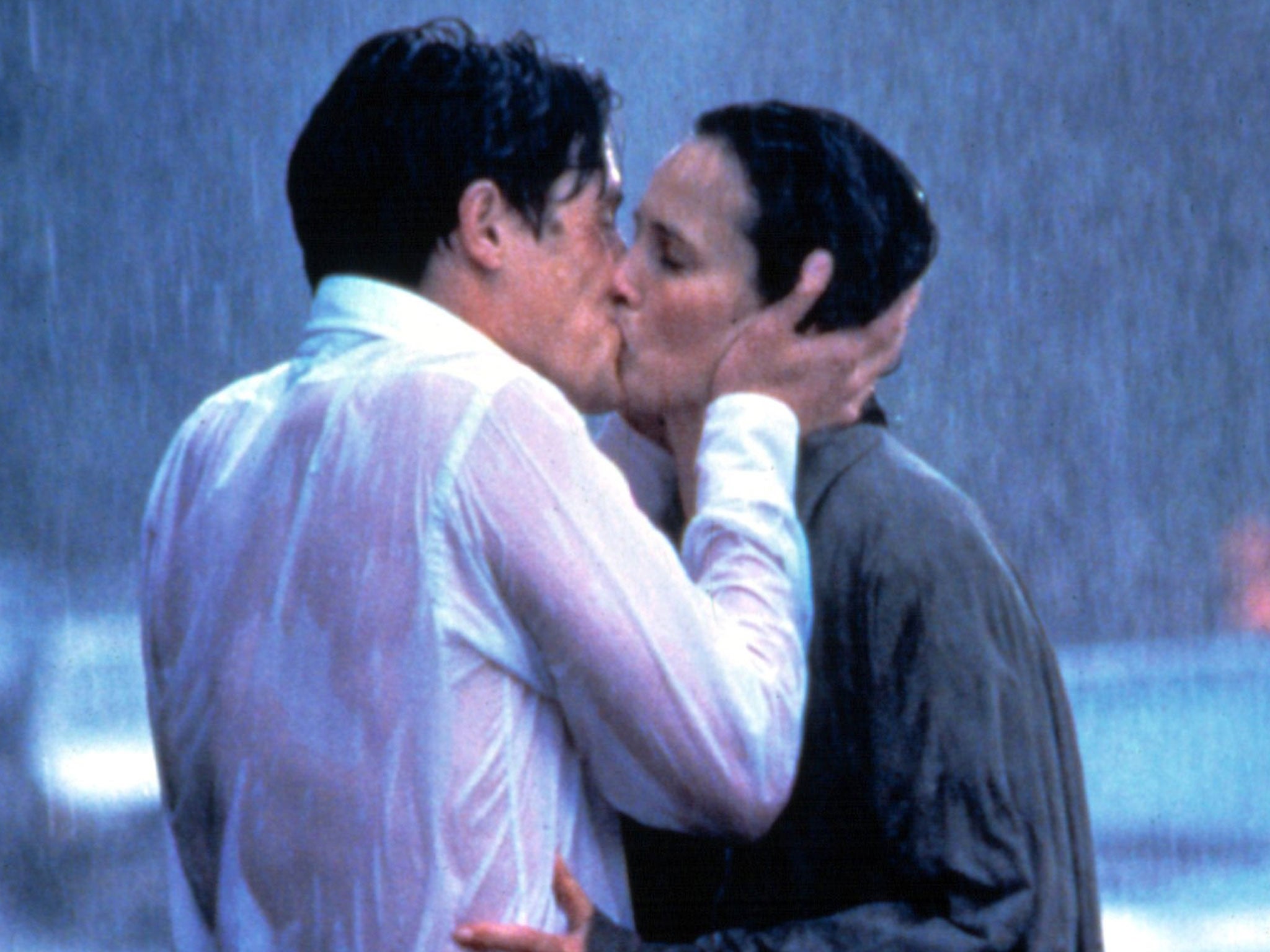 Hugh Grant kisses Andie MacDowell in Four Weddings and a Funeral (Rex)