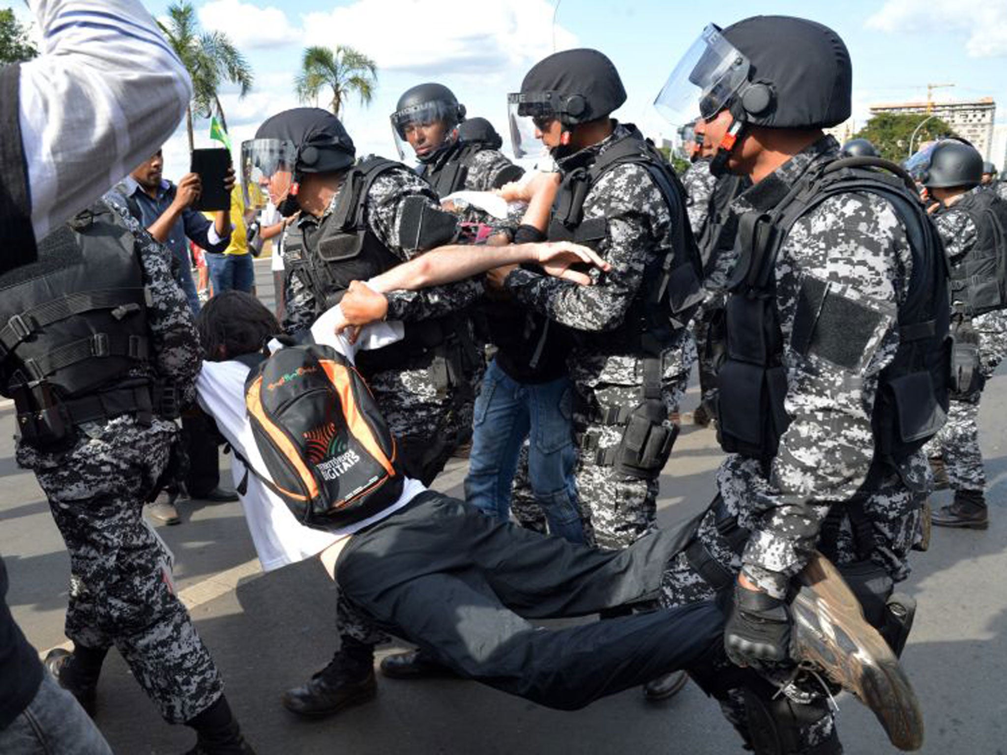 Police fired tear gas and rubber bullets to disperse crowds yesterday as protests marred a second successive day of the Confederations Cup in Brazil