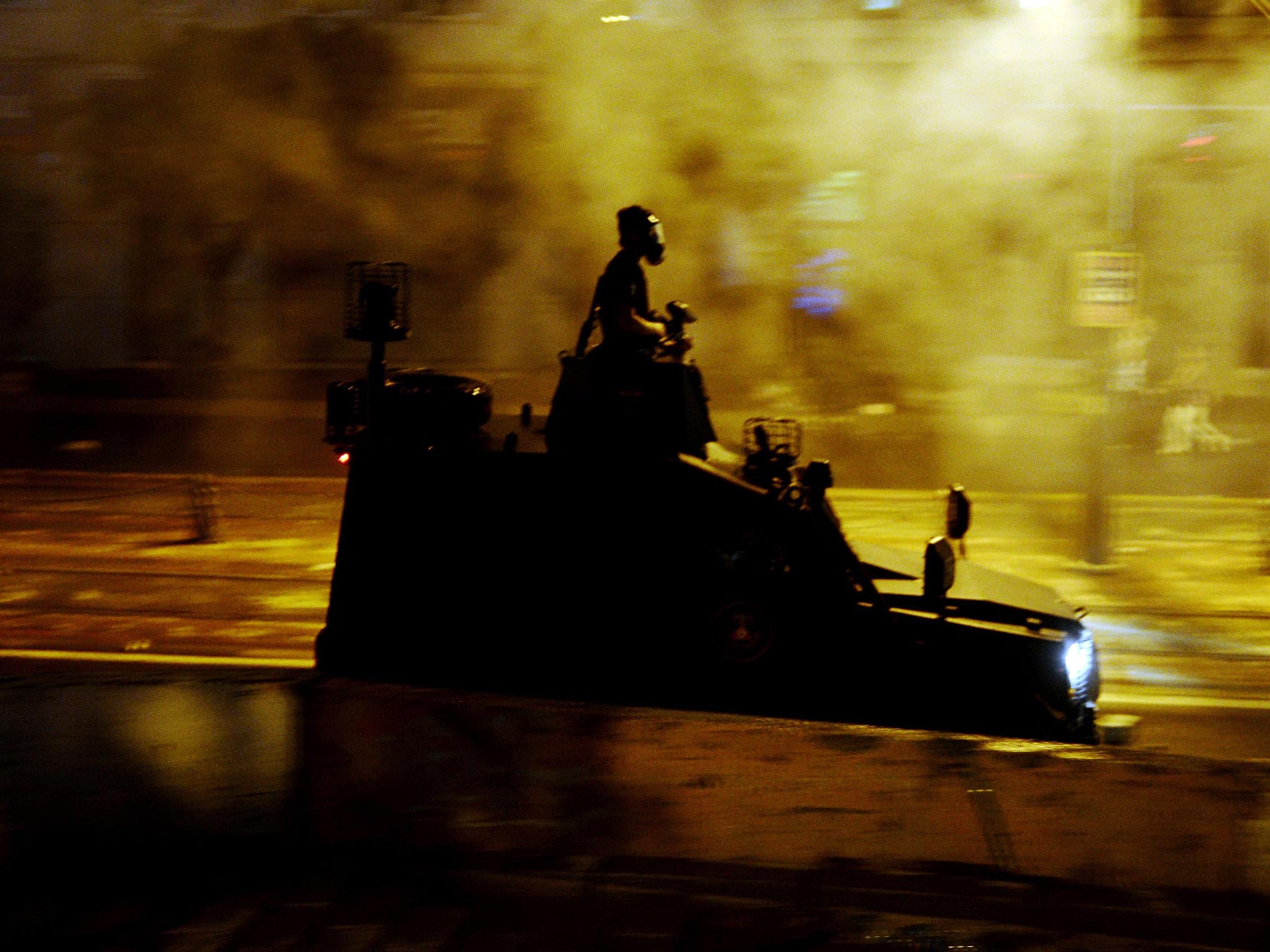 Police officer patrol on armored vehicle after the clashes between Turkish riot police and anti-government protesters in Istanbul, Turkey