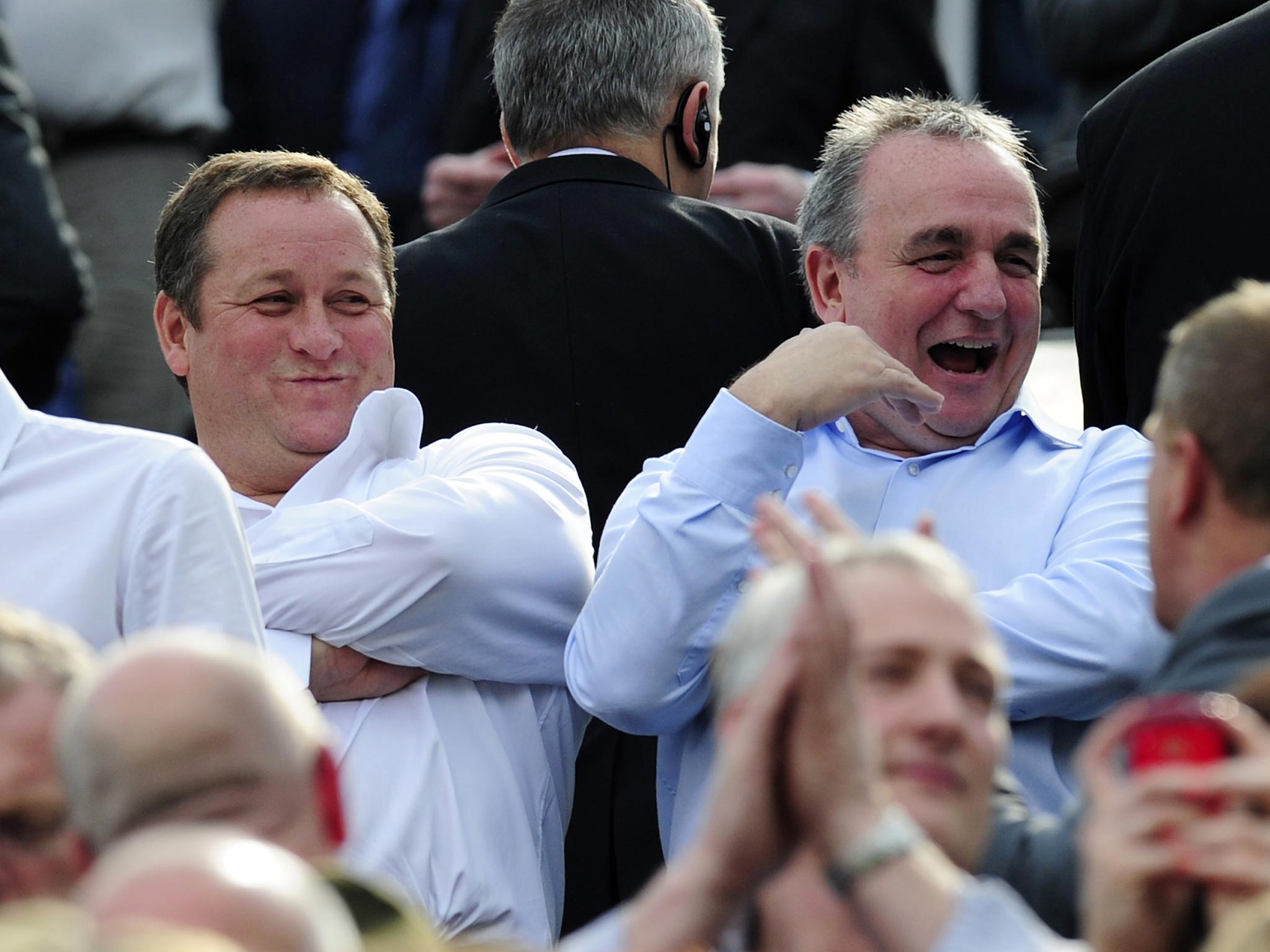 Newcastle owner Mike Ashley (L) and former director of football Derek Llambias (R)