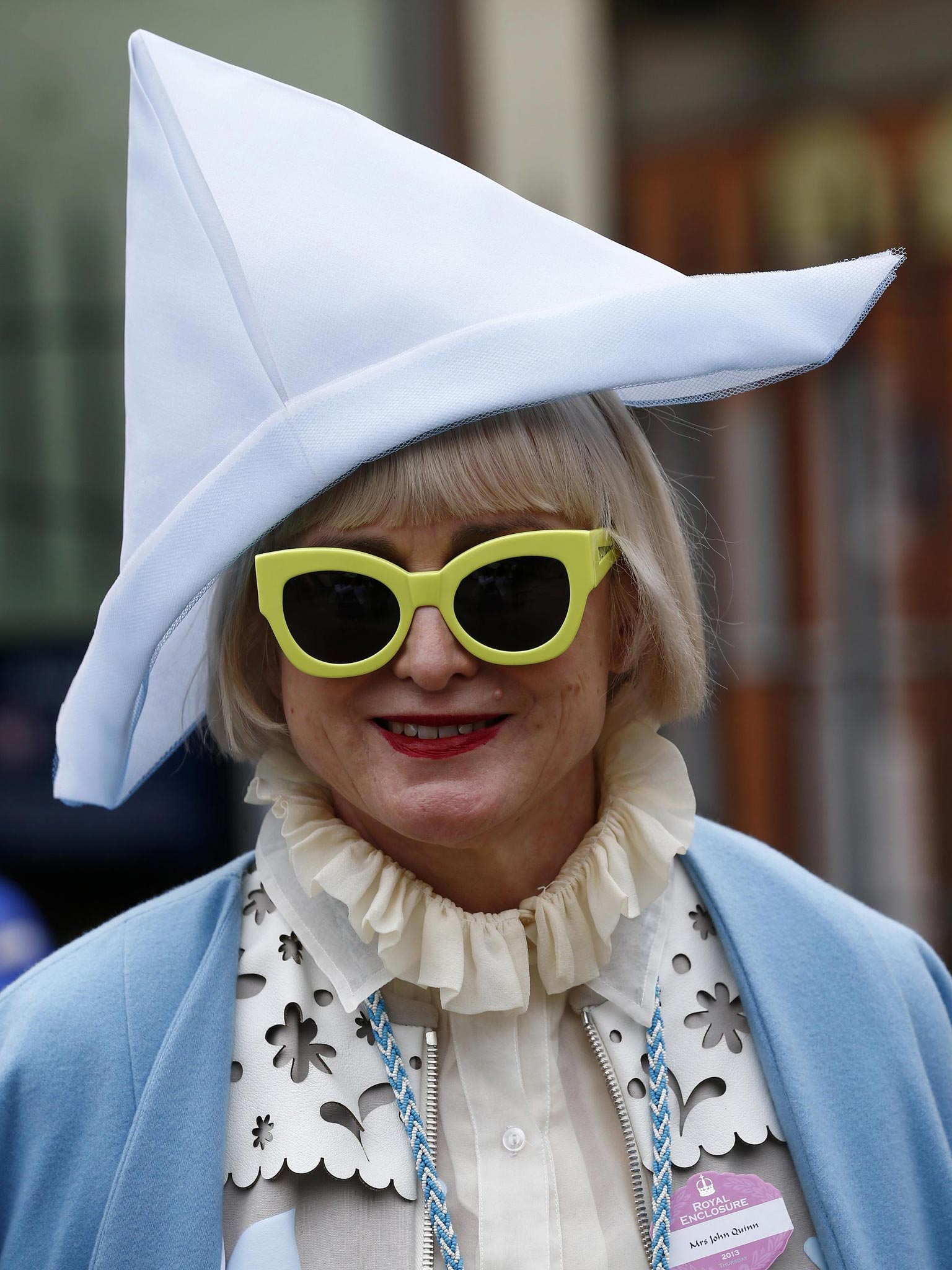A racegoer arrives for Ladies' Day at the Royal Ascot horse racing festival at Ascot
