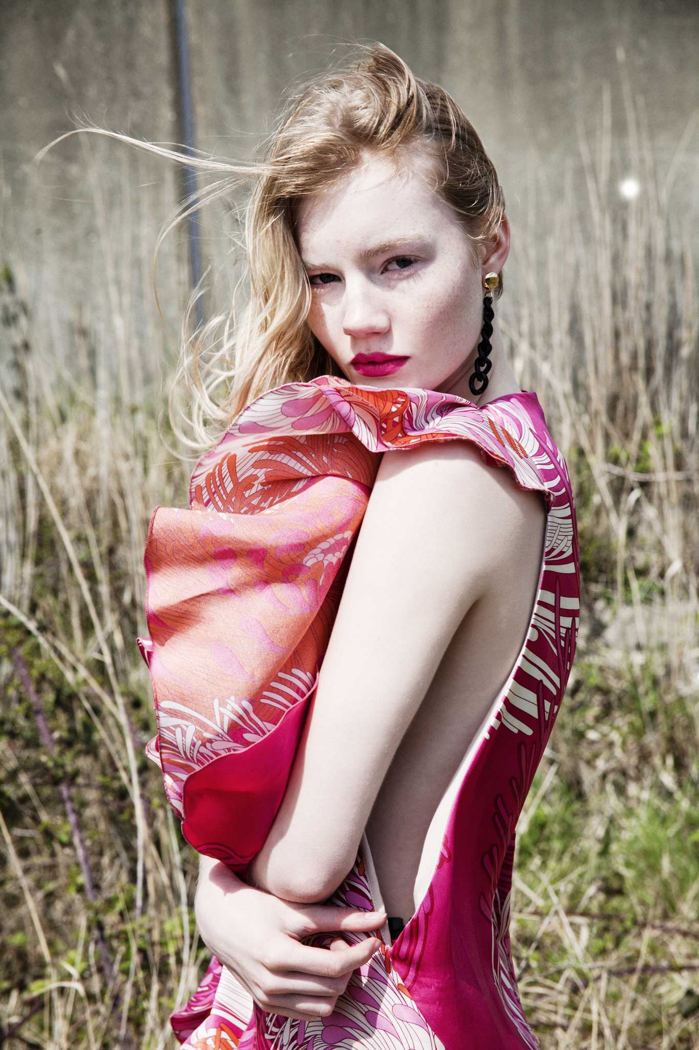 Printed dress, £1,720, by Gucci, 18 Sloane Street, London SW1, 020-7235 6707; chain earring, £14.50 (for pair), by Freedom at Topshop, 01277 844 476