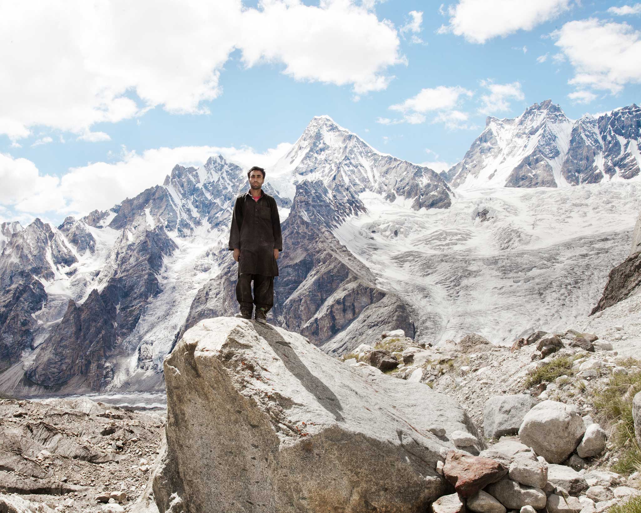 Muhammad Isaac, a member of a mining team which hunts for gems in the same mountains as Ashraf