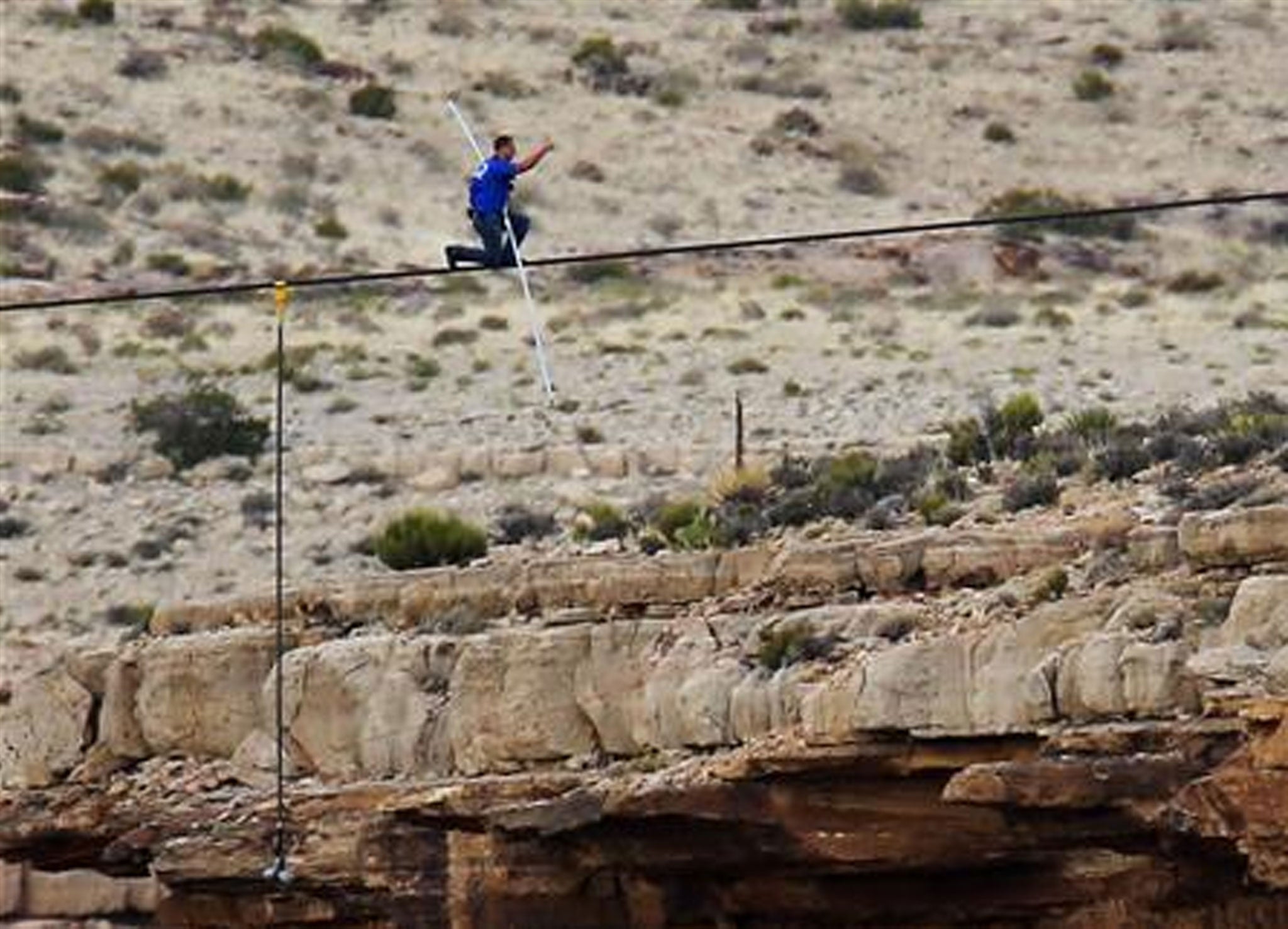 Don't look down! Nik Wallenda crosses the Grand Canyon on just two inches of steel rope 