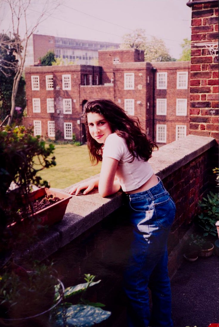 A young Amy outside her nan's flat in Southgate