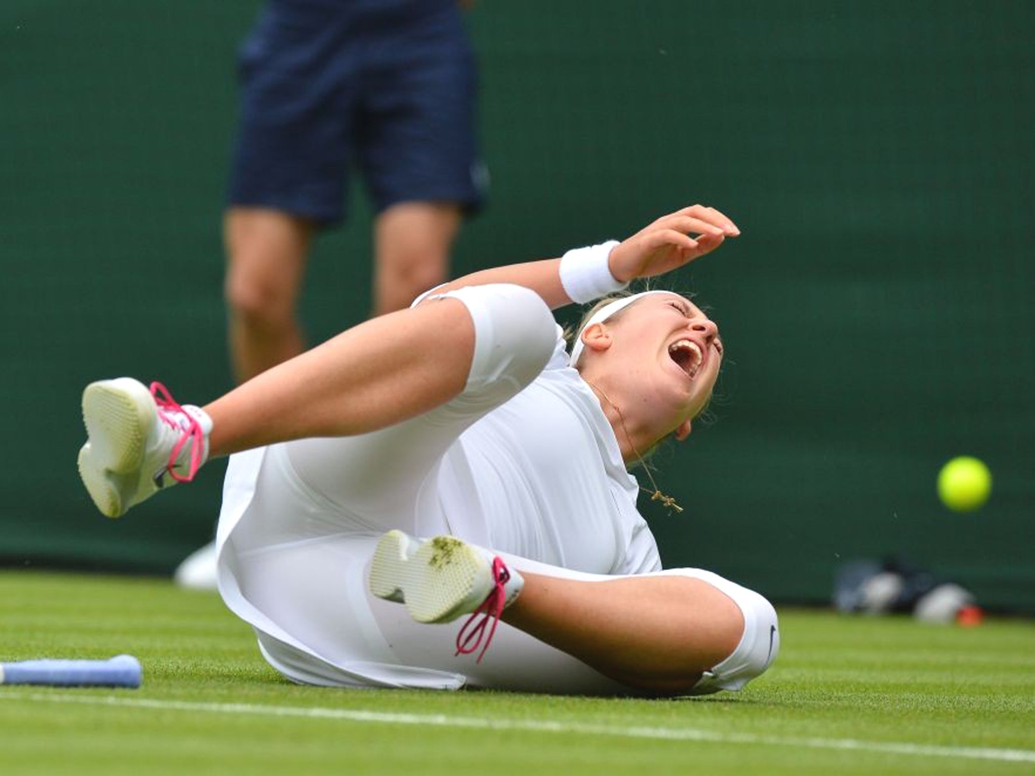 Second-seeded Victoria Azarenka overcame a right knee injury from a scary fall for a 6-1, 6-2 victory over Maria Joao Koehler