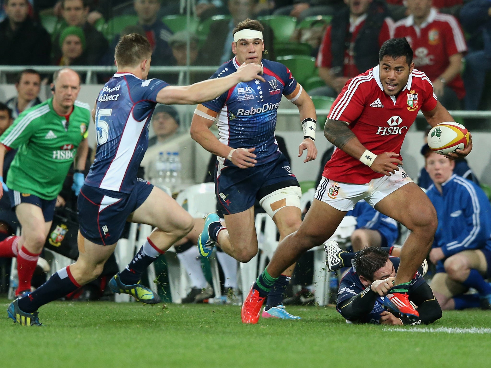 Manu Tuilagi of the Lions breaks with the ball during the match between the Melbourne Rebels and the British & Irish Lions