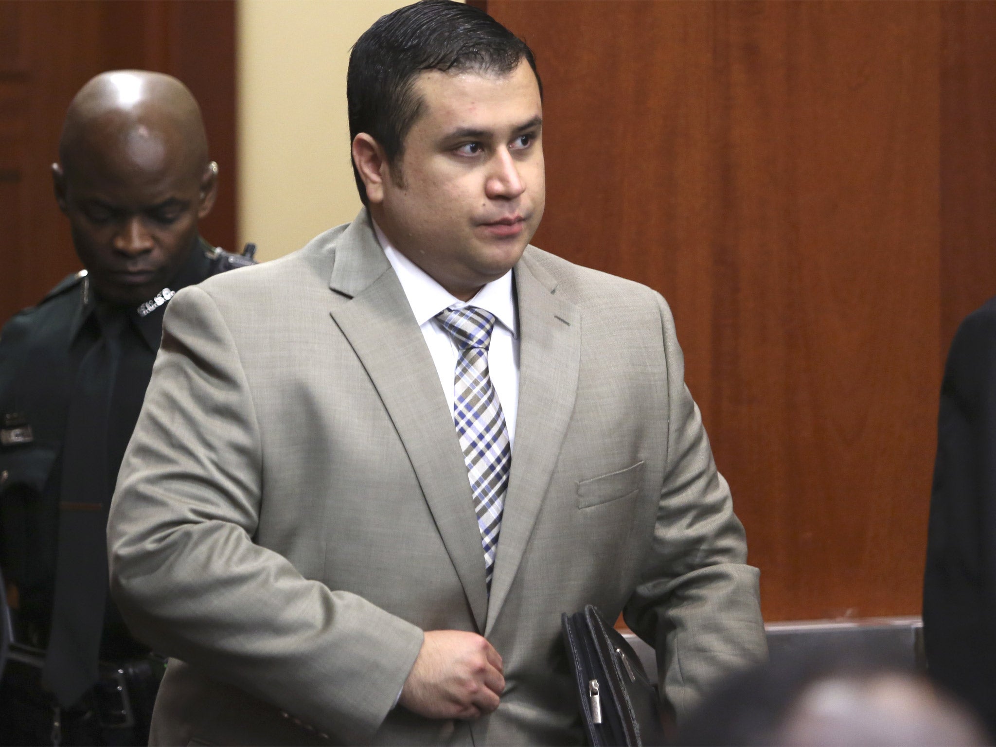 George Zimmerman enters the courtroom in Florida